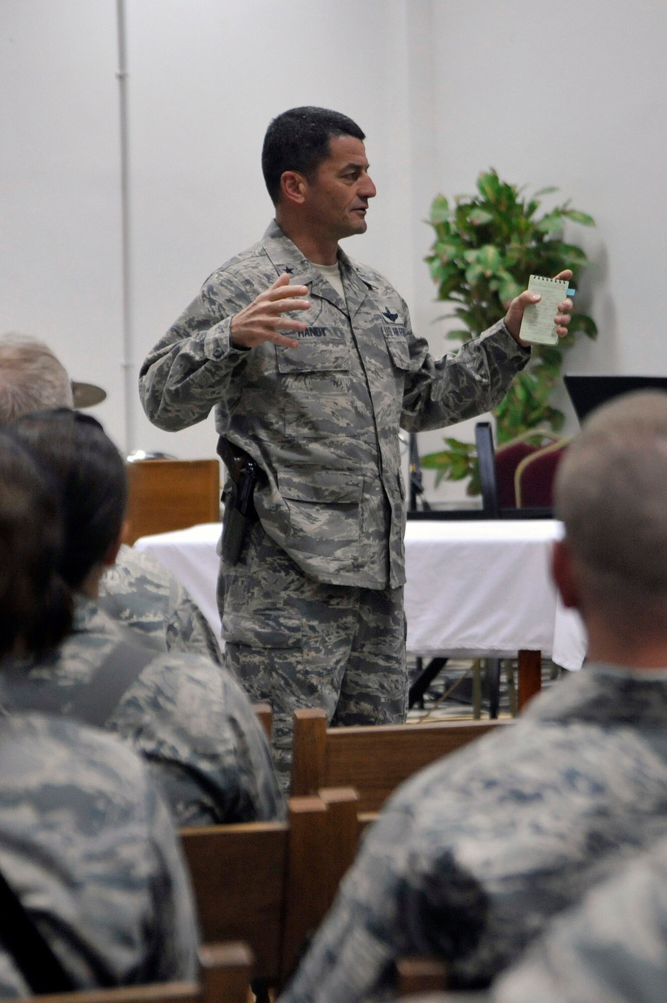 Brig. Gen. Russell Handy, director of the Air Component
Coordination Element - Iraq, and commander of Detachment 2, 9th Air
Expeditionary Task Force speaks to Airmen during a commander's call Sept.
20, 2010, at Forward Operating Base Union III. The top Airman in Iraq and
members of his staff will travel to forward operating locations throughout
Iraq to assess the needs and welfare of their Airmen, give them a better
understanding of how they work and live, and how the ACCE-I can help them
best accomplish their missions.  
