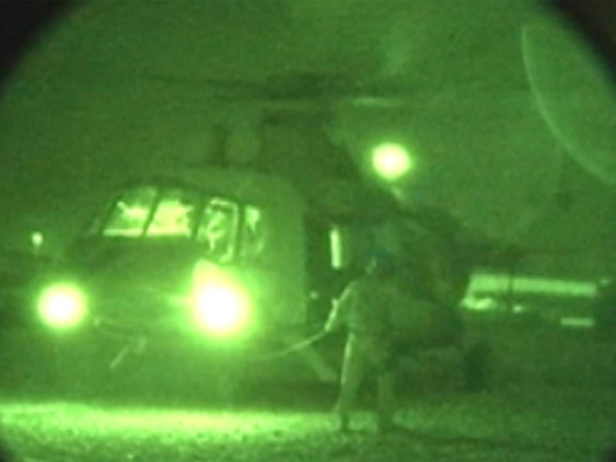 LAGHMAN PROVINCE, Afghanistan - Members of the AAF and NATO load boxes of election ballots on the AAF Mi-17 during the first night operations mission on Sept. 28, 2010. (U.S. Air Force photo by TSgt. Anthony Iusi/RELEASED).