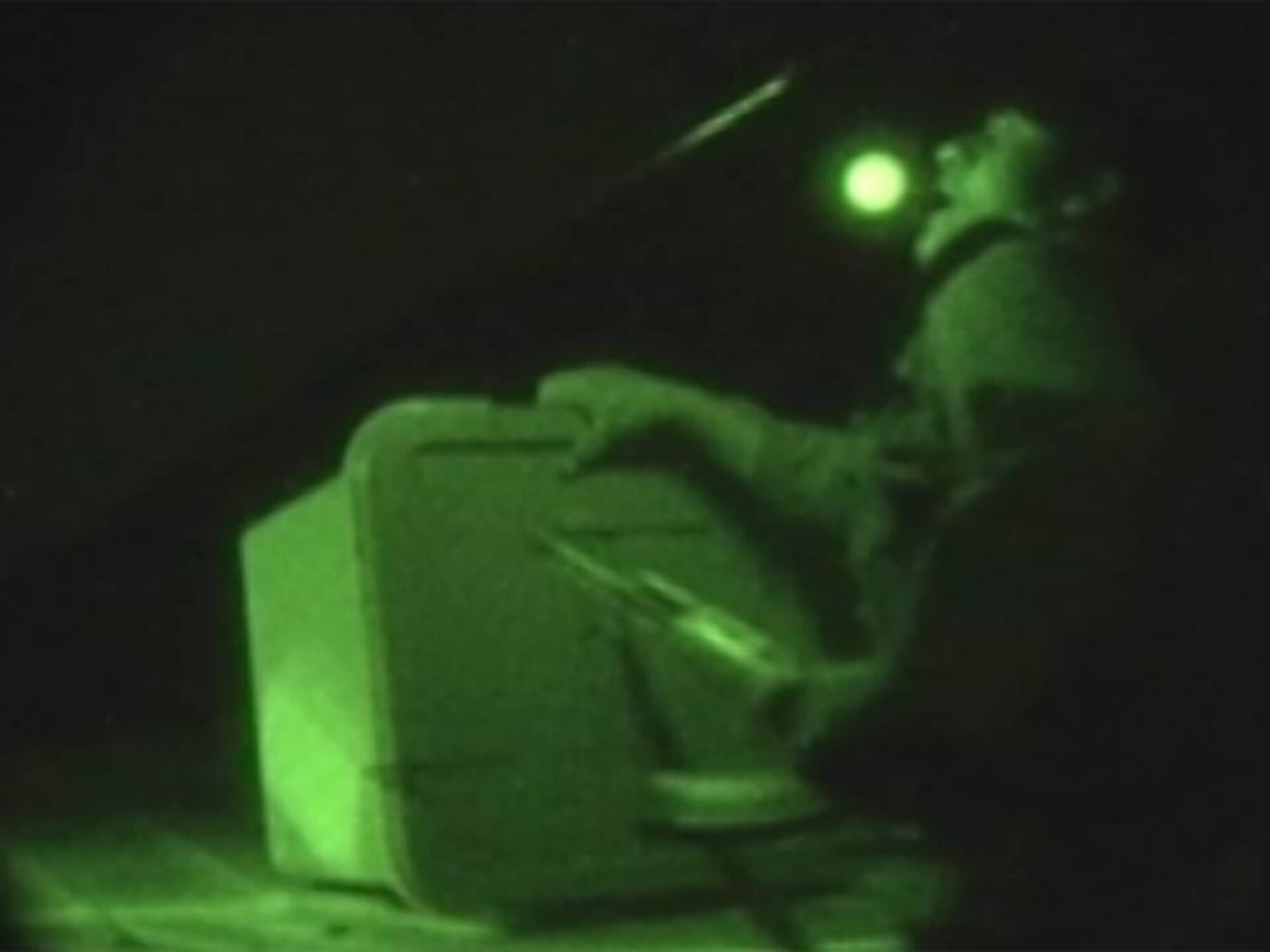 LAGHMAN PROVINCE, Afghanistan - Members of the AAF and NATO load boxes of election ballots on the AAF Mi-17 during the first night operations mission on Sept. 28, 2010. (U.S. Air Force photo by TSgt. Anthony Iusi/RELEASED).