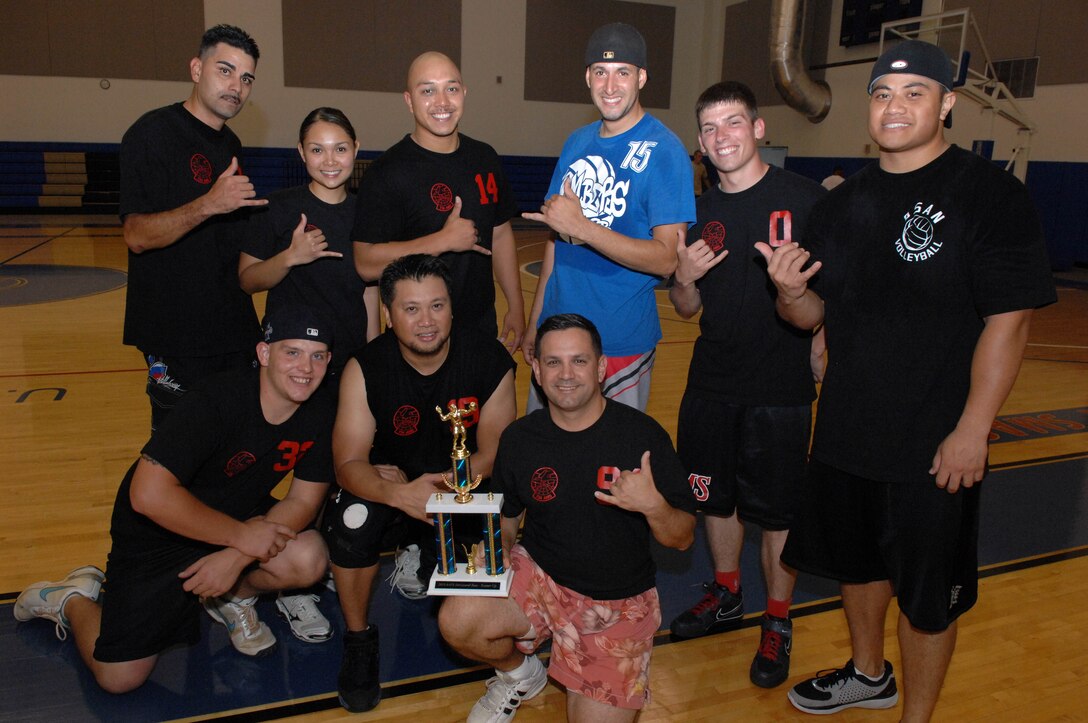 The 734th Air Mobility Squadron volleyball team poses with their intramural volleyball season second-place trophies at the Coral Reef Fitness Center Sept. 24. The 254th Air National Guard were crowned champions after narrowly defeating the 734th, 2-1, during the 2010 Intramural Volleyball Championship. (U.S. Air Force photo/Airman Julian North)