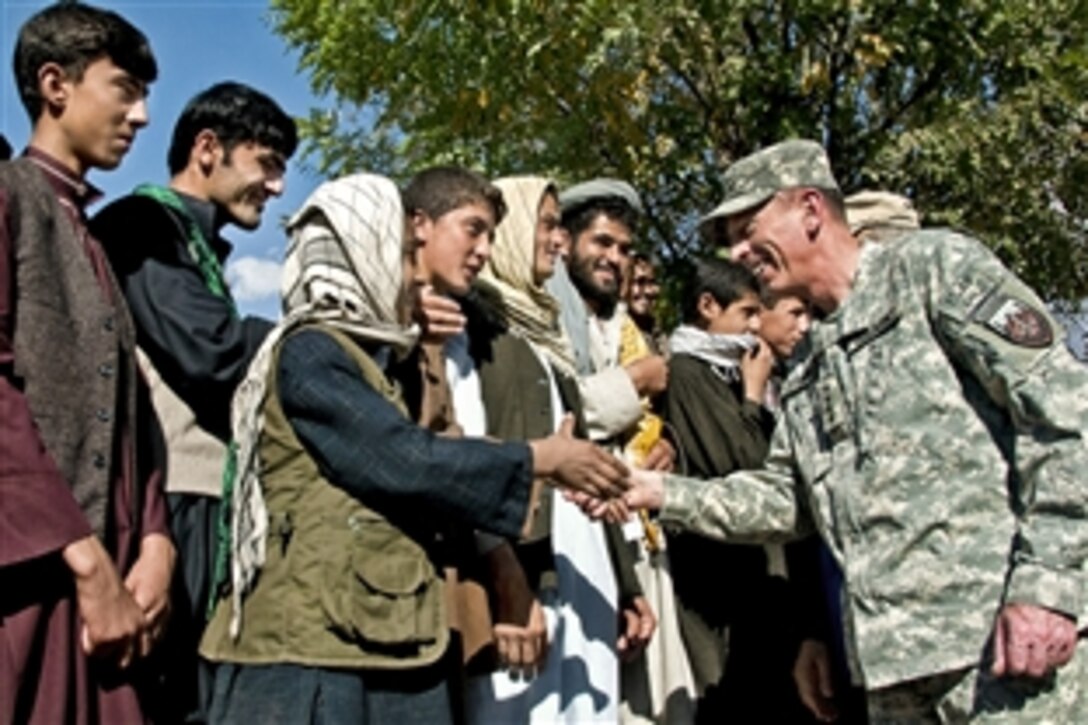 U.S. Army Gen. David H. Petraeus, commander of the International Security Assistance Force in Afghanistan, visits a road construction project in Badakshan province, Afghanistan, Sept. 30, 2010.