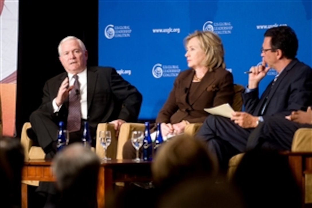 Secretary of Defense Robert M. Gates (right), Secretary of State Hillary Rodham Clinton and moderator Frank Sesno director School of Media and Public Affairs George Washington University take part in the U.S. Global Leadership Coalition roundtable discussion along with USAID Administrator Rajiv Shah, Treasury Secretary Timothy Geithner and Millennium Challenge Corporation CEO Daniel Yohannes in Washington, D.C., on Sept. 28, 2010.  