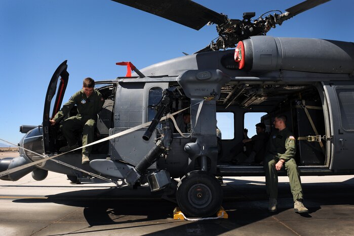 NELLIS AIR FORCE BASE, Nev. --  U.S. Air Force Academy cadets explore the inside of a HH-60 Pave Hawk, April 1. The purpose of this visit was to motivate cadets to pursue a career in the Air Force by exposing them to the many ways Nellis Airmen support the war effort.(U.S. Air Force photo by Senior Airman Brett Clashman)
