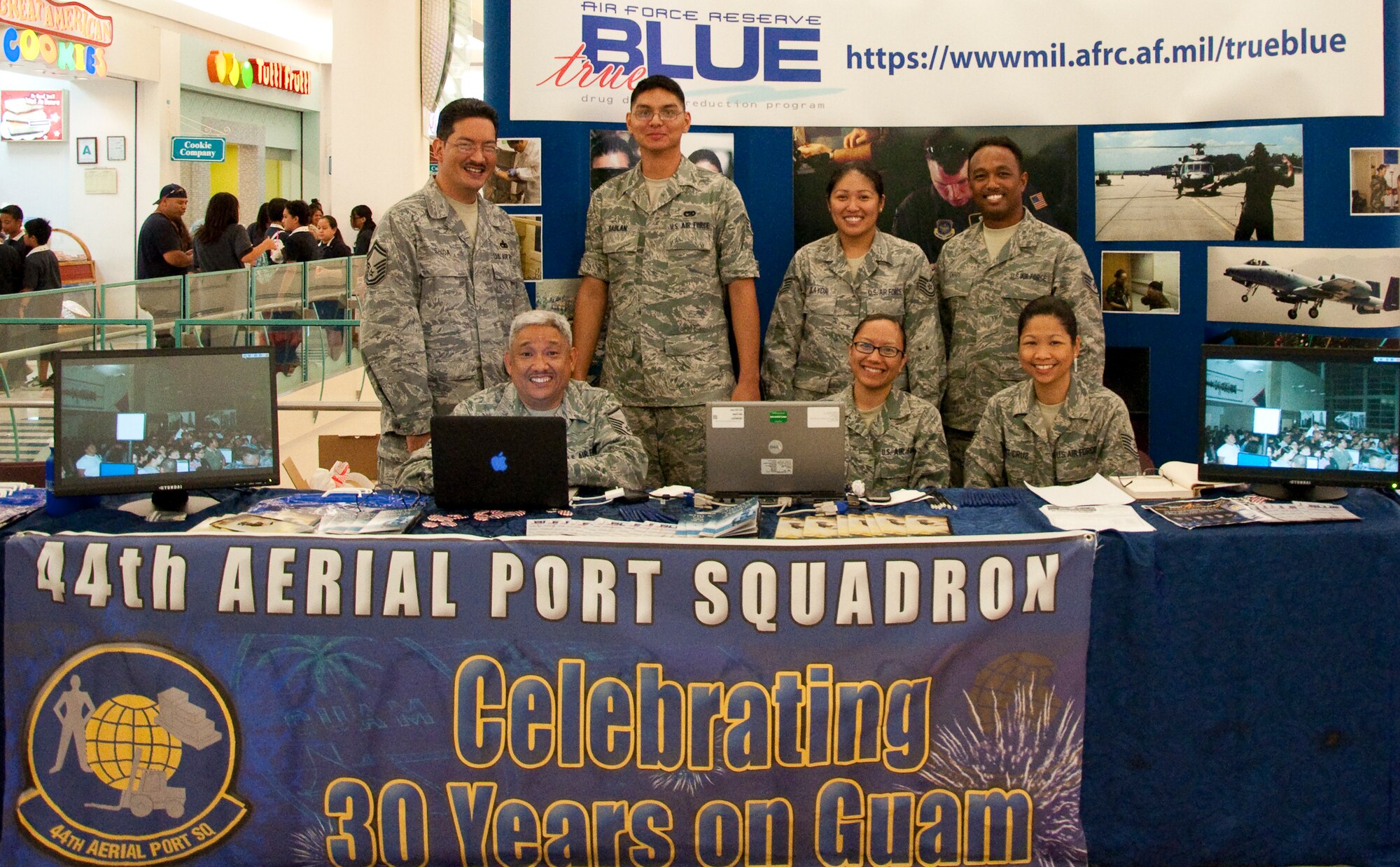 Top Row (L-R): Senior Master Sgt. Carlos Shoda, Senior Airman Josh Sablan, Tech. Sgt. Desyree Elayda, Staff Sgt. Glenn Diggs; Bottom Row(L-R): Master Sgt. Ramon Peredo, Senior Airman Angel-Markay Mafnas, 44th Aerial Port Squadron, and Tech Sgt. Tech. Sgt. Virgie Vince-Cruz, 724th Aeromedical Staging Flight, represented the Air Force Reserve at the informational and drug demand reduction display at the Guam Micronesia Mall, March 24-25. The display was part of the 30th Anniversary Celebration and Month of the Air Force Reserve on Guam. (U.S. Air Force Photo/Staff Sgt. Erin Smith)