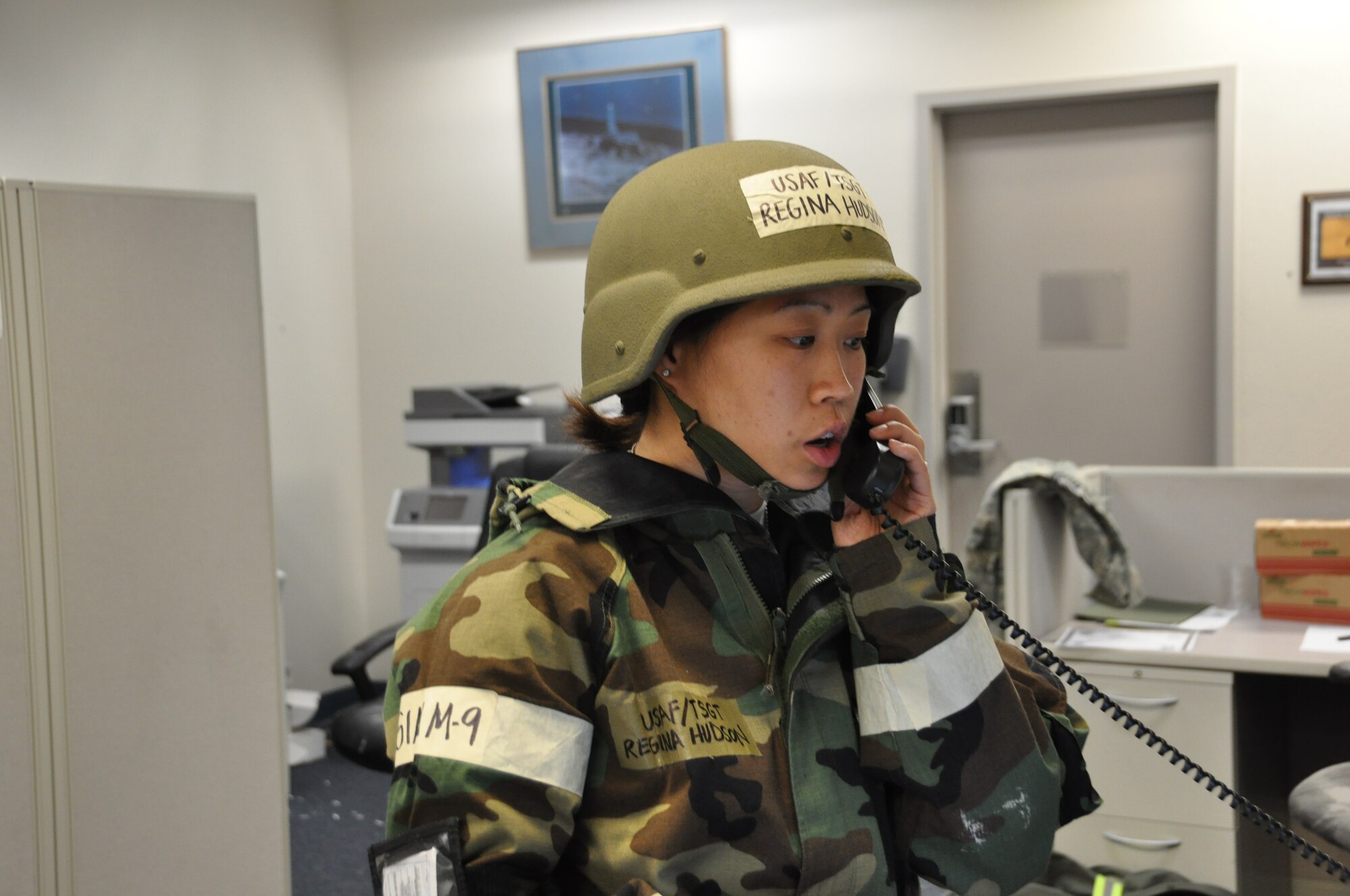 Tech Sgt. Regina Hudson, NCOIC of 301st Communications Focal Point, receives a simulated incoming emergency notification during day one of the 301st Operational Readiness Exercise (ORE) here. Weeks of preparation by CF personnel was key in laying the groundwork for sucess in the ORE exercise. (U.S. Air Force photo/SSgt Chris Bolen)