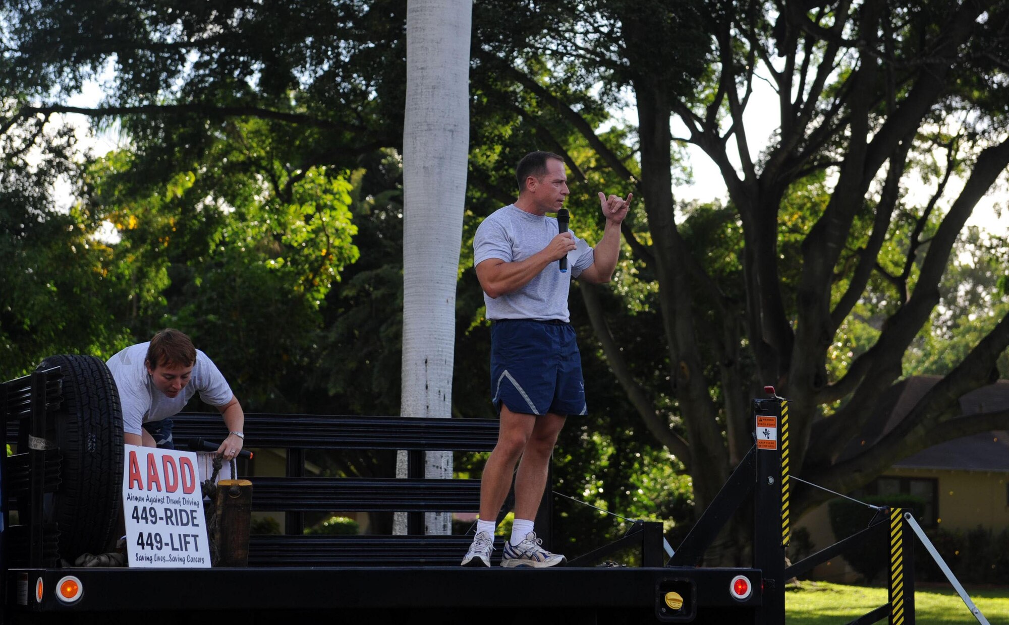 Lt. Col. Christopher Dun, 15th Medical Group vice commander, encourages Airmen not to drink and drive after completion of the  monthly "Warrior Run" Apr. 1 which begins and ends at Hickam Mall. The run, which spans approximately two miles, was hosted this month by the 15th Medical Group. (U.S. Air Force photo by Staff Sgt. Nathan Allen)