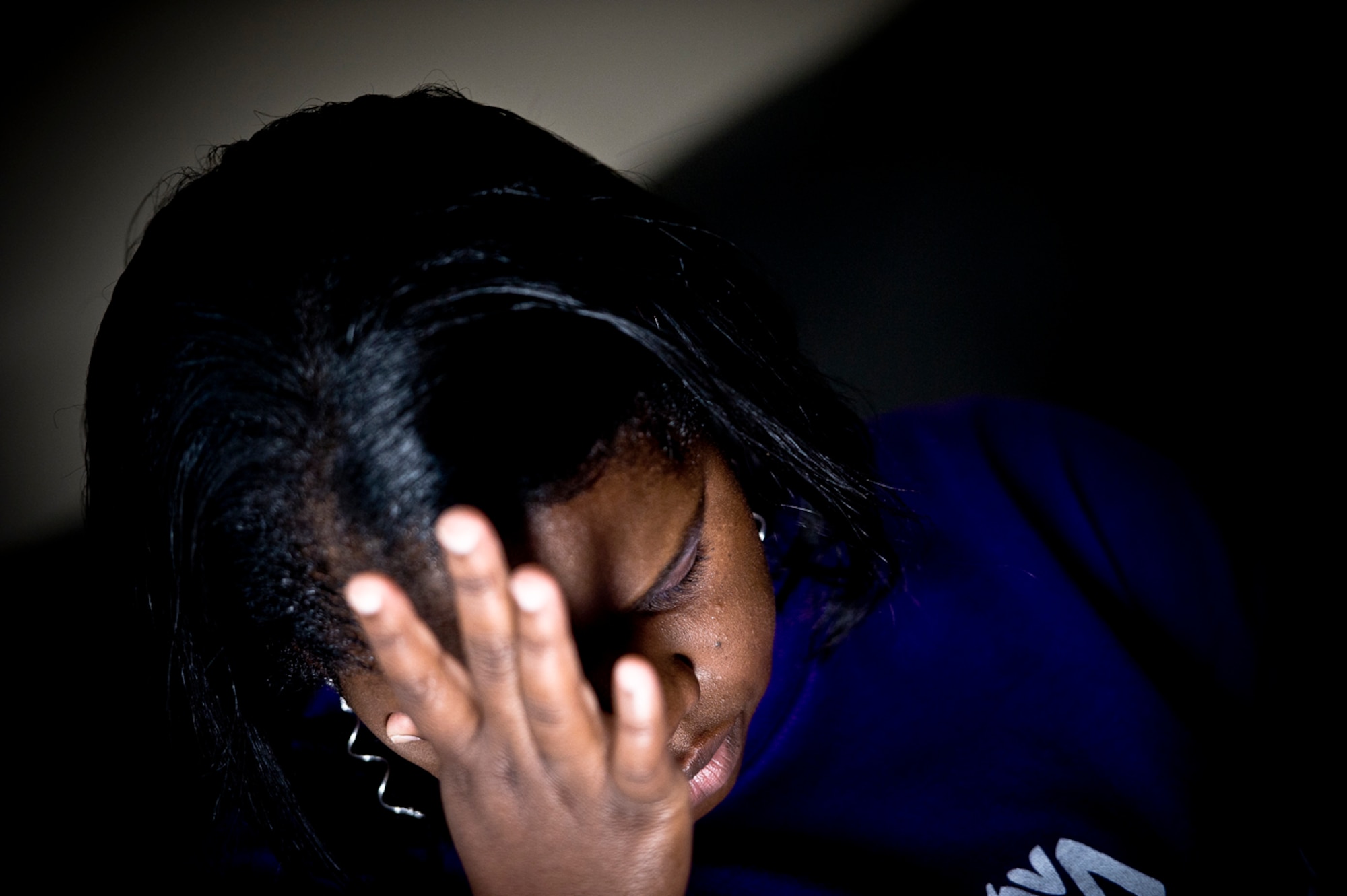 Anika Lee, Nathaniel's aunt, takes a moment to collect herself before continuing to talk about losing her best friend ? older sister Audra ? and the void it has left in her life. 
(Photo by Samuel Bendet)