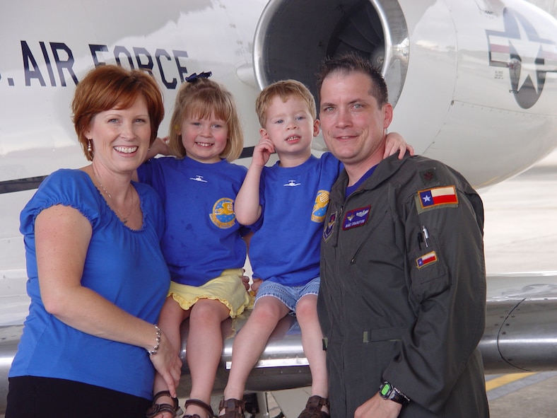 Maj. Cranston finishes his last flight on a J-1 Jayhawk receiving a warm welcome from his family. (USAF Photo)