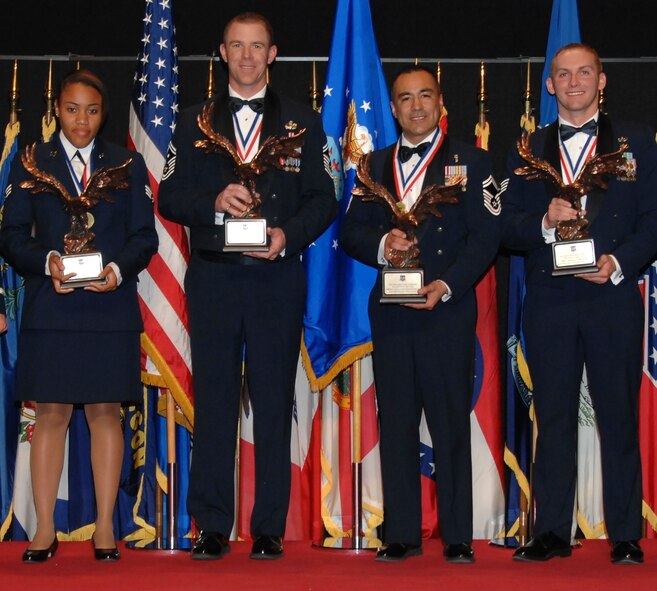 The Air Force Materiel Command's Annual Enlisted Award winners for 2010 are (from left) Senior Airman Sophia F. Joanis, Lackland AFB, Texas; Senior Master Sgt. Craig A. Neri, Wright-Patterson AFB, Ohio; Senior Master Sgt. Mario Aceves-Fonseca, Edwards AFB, Calif., and Staff Sgt. Jordan S. Bishopp, Kirtland AFB, N.M. (U.S. Air Force photo/Ben Strasser) 
