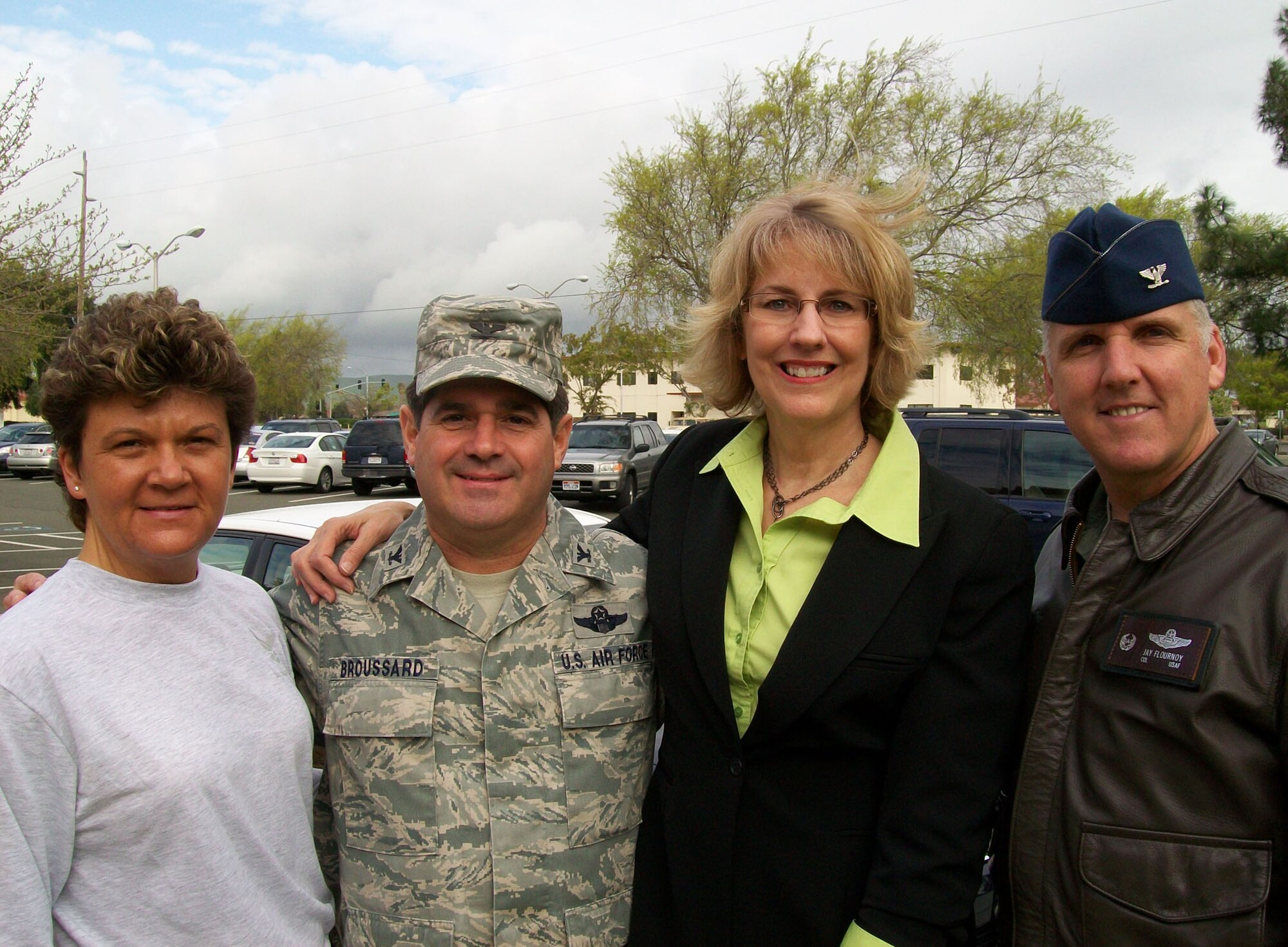 TRAVIS AIR FORCE BASE, Calif. -- (Pictured left to right) Chief Master Sergeant Kathleen R. Buckner, Command Chief Master Sergeant, 349th Air Mobility Wing , Col. Barrett Broussard, Vice Commander  349th AMW, Ms. Kay Frances, special guest motivational speaker,  and Col. John "Jay" C. Flournoy, Jr.,  Commander 349th AMW. (U.S. Air Force courtesy photo) 