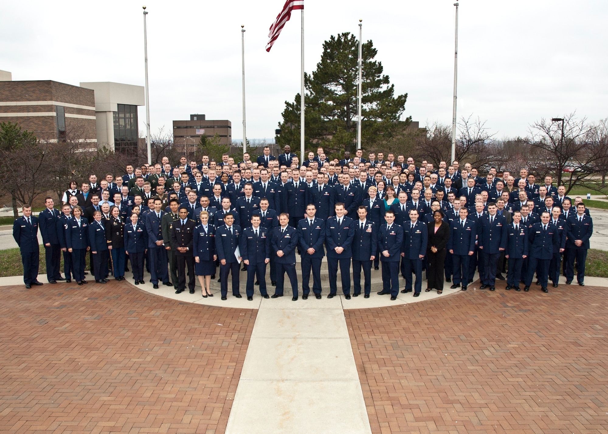 The Air Force Institute of Technology class of 2011 stands for a class photo on the AFIT campus.
