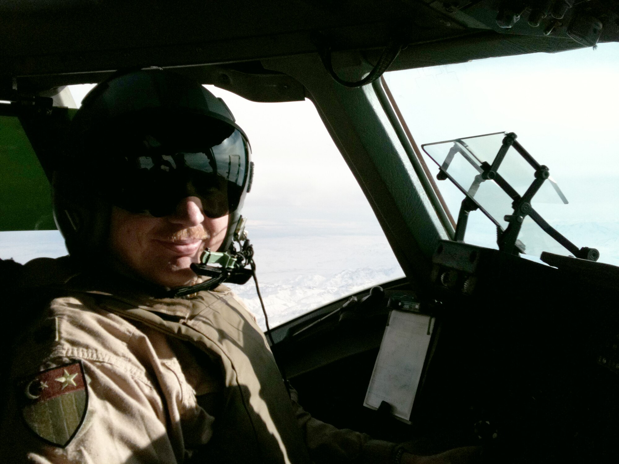 Maj. Roy Bentley flies a C-17 Globemaster III during his latest deployment to Southwest Asia in March 2011. Major Bentley is currently deployed with the 817th Expeditionary Airlift Squadron in Southwest Asia. (Courtesy photo) 