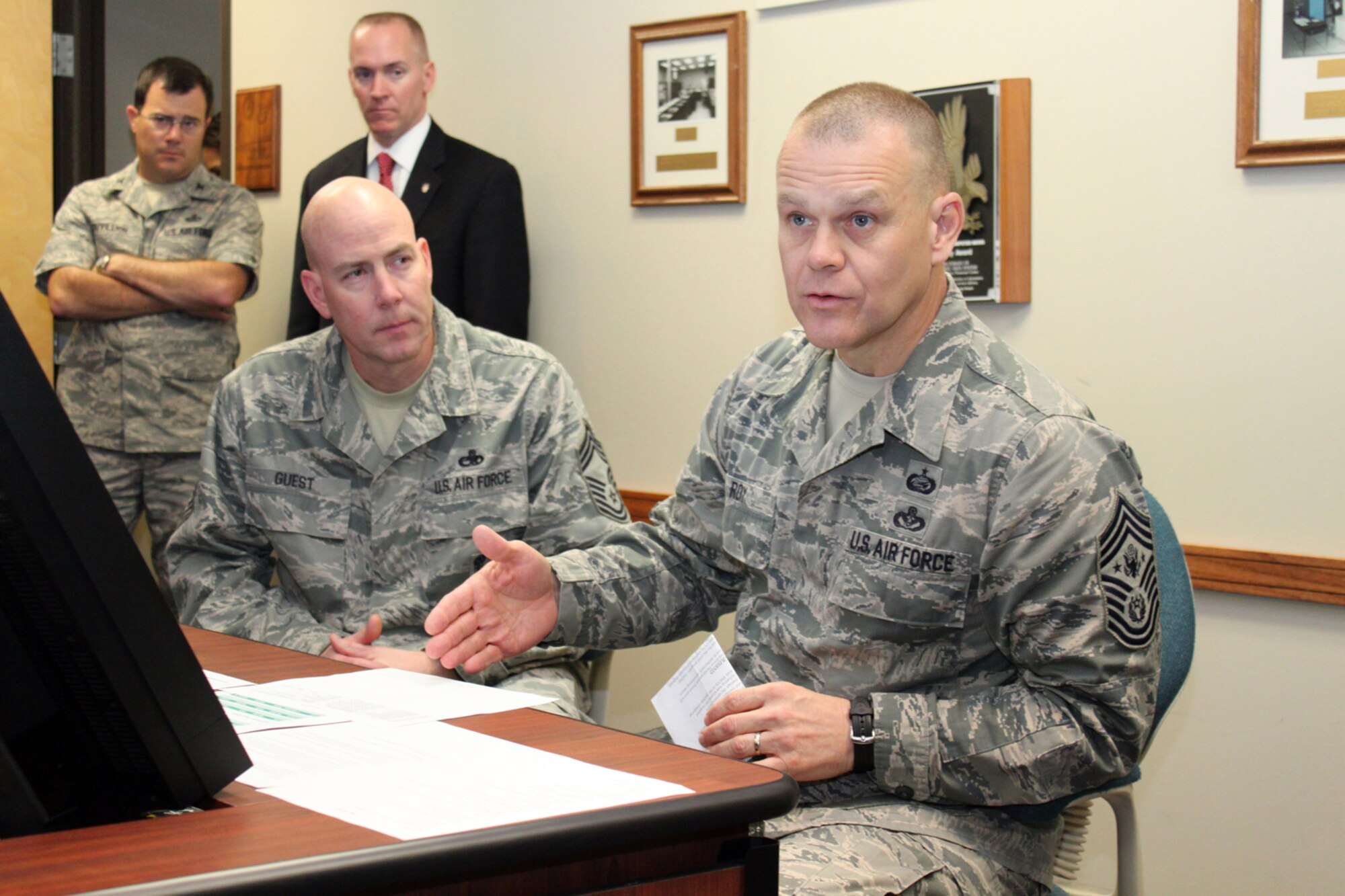 Chief Master Sgt. of the Air Force James Roy discusses the enlisted development tool with the nuclear weapons career field developmental team panel as Chief Master Sgt. Ray Guest, the Air Force's nuclear weapons career field manager, looks on March 31. (U.S. Air Force photo/Tech. Sgt. Steve Grever)
