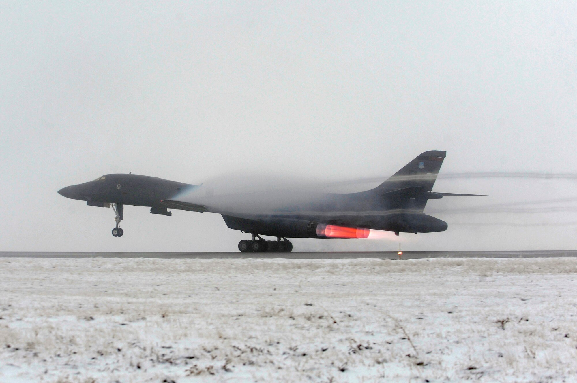 A B-1B Lancer takes off in support Operation Odyssey Dawn from Ellsworth Air Force Base, S.D., March 27, 2011.   This mission marked the first time the B-1 fleet has launched combat sorties from the continental United States to strike targets overseas. (U.S. Air Force photo/Staff Sgt. Marc I. Lane)