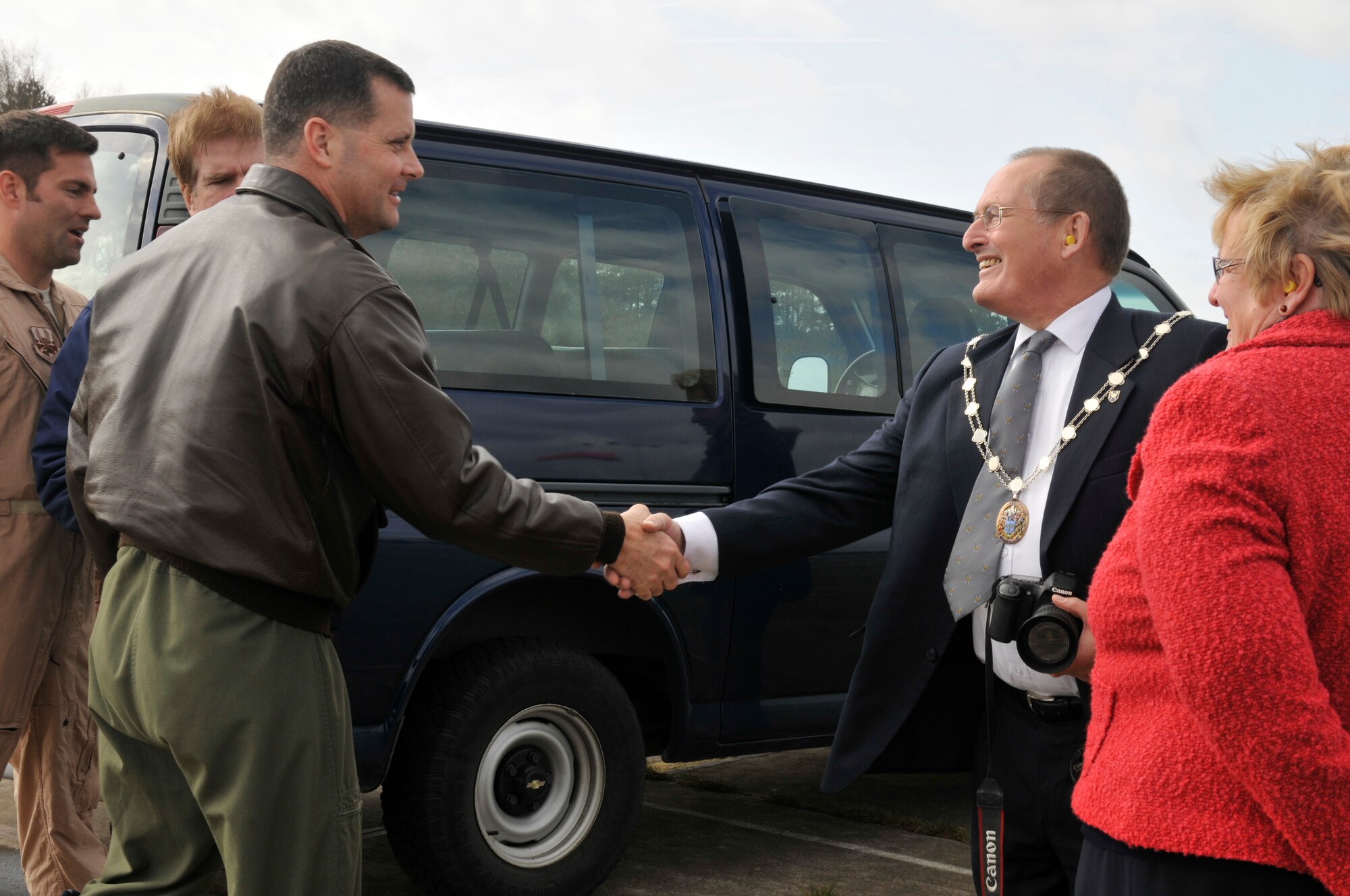 ROYAL AIR FORCE LAKENHEATH, England -  Col. Daniel Orcutt, 48th Operations Group commander (left), greets The Worshipful The Mayor of St. Edmundsbury Councillor Ian Houlder during his visit to the 493rd Fighter Squadron on March 31. Councillor Houlder visited the squadron to familiarize himself with the Airmen who fly the jets daily over his city. (U.S. Air Force photo/Senior Airman Tiffany M. Deuel)