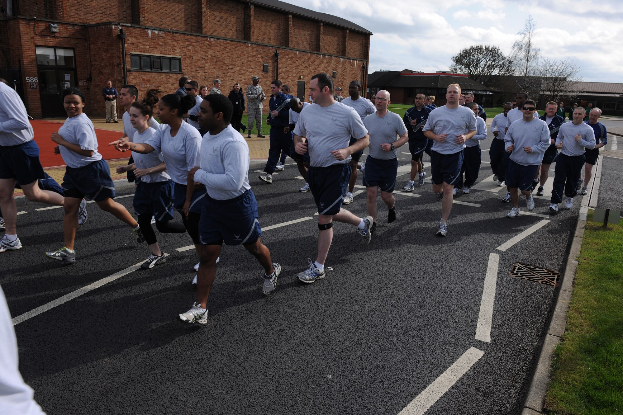 Airmen from the 501st Combat Support Wing start the Fun Run to kick off Sexual Assault Awareness Month.  (U.S. Air Force photo by Tech. Sgt. John Barton)