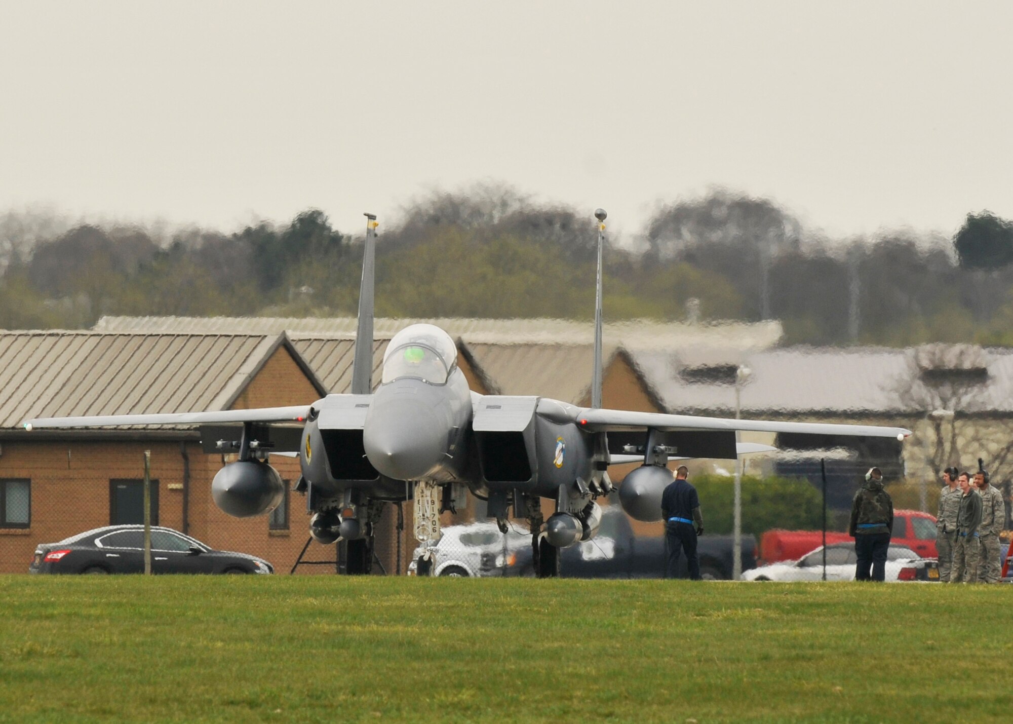 ROYAL AIR FORCE LAKENHEATH, England - An F-15E Strike Eagle from Seymour Johnson Air Force Base, N.C., undergoes de-arming prior to take-off at RAF Lakenheath on March 26, 2011. They were returning from a regular deployment to Southwest Asia.(U.S. Air Force photo/Senior Airman Tiffany M. Deuel)