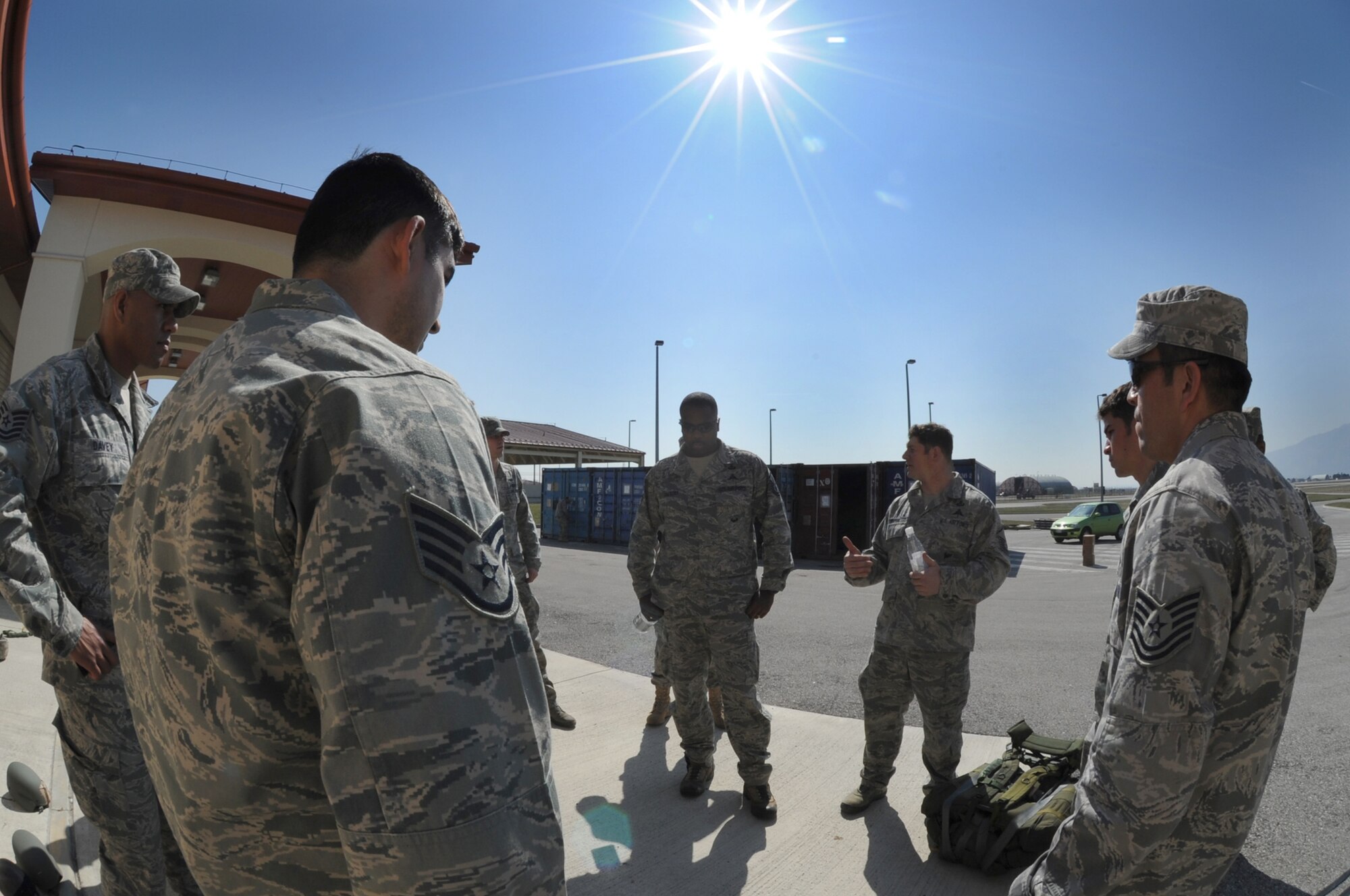 Members of the U.S. Army 173rd Airborne Brigade Combat Team rest after jumping from a C-17 Globemaster III during a joint coalition training exercise March 23, 2011, at Aviano Air Base, Italy. More than 1,400 personnel from the 173rd ABCT, the 8th Air Support Operation Squadron and Italian army paratroopers participated in the weeklong event. (U.S. Air Force photo/Airman Briana N. Jones)