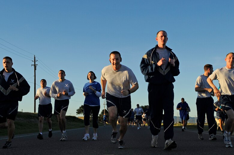 VANDENBERG AIR FORCE BASE, Calif. – Members of Team V ran the last leg of the Fit-to-Fight Run here Thursday, March 31, 2011. The participants were authorized to wear blue T-shirts in support of Child Abuse Prevention Month or teal T-shirts in support of Sexual Assault Awareness Month. (U.S. Air Force photo/Senior Airman Lael Huss)
