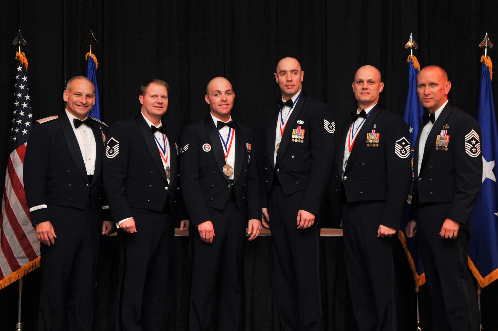 Lt. Gen. James Kowalski, Air Force Global Strike Command commander, and
Chief Master Sgt. Brian Hornback, AFGSC command chief (far right),
recognized winners of the Air Force Global Strike Command Outstanding Airmen
of the Year during a banquet March 24 in Shreveport, La. From L to R: Master
Sgt. Tyler Terrel, Outstanding Senior Non-Commissioned Officer of the Year;
Senior Airman Toby Harter, Outstanding Airman of the Year; Tech. Sgt.
Bradley Williams, Outstanding Non-Commissioned Officer of the Year; and
Master Sgt. Stephen Hart, Outstanding First Sergeant of the Year.  (U.S. Air
Force photo/Airman 1st Class Micaiah Anthony)