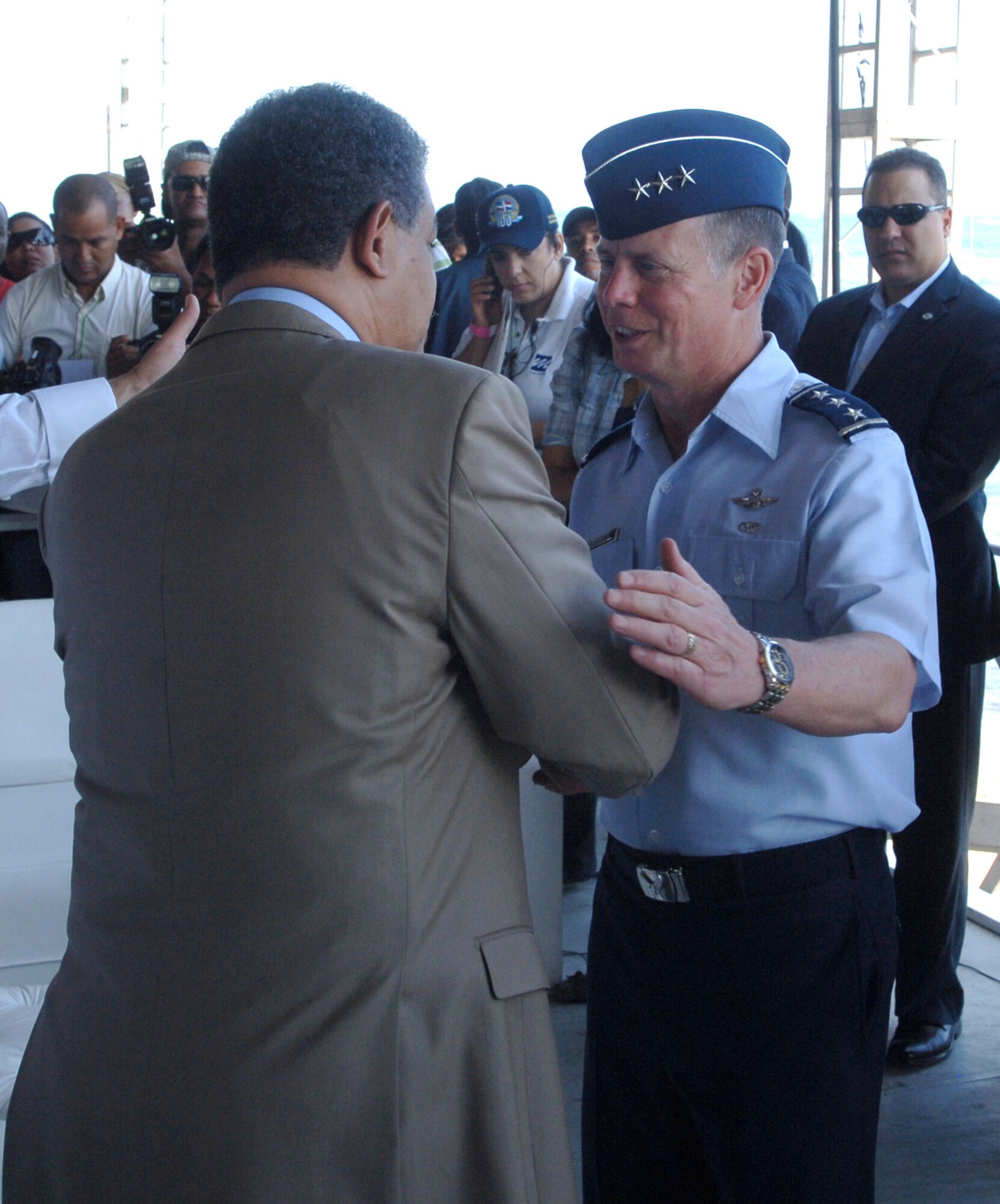 Dominican Republic President Leonel Fernandez (left) greets Lt. Gen. Glenn Spears, 12th Air Force (Air Forces Southern) commander, during The Great Air Show Mar. 26 in Santo Domingo, Dominican Republic. (U.S. Air Force photo/Tech. Sgt. Eric Petosky)