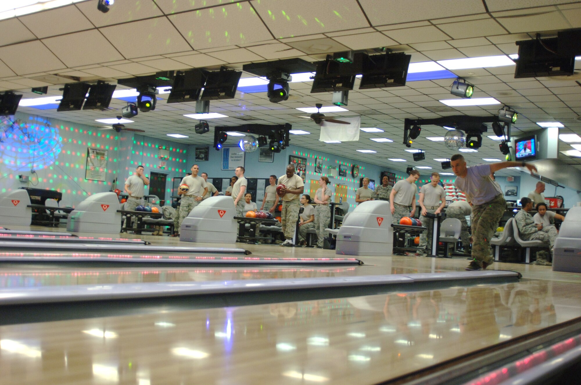 Junior Enlisted Airmen, chief master sergeants and first sergeants suit up to take down pins at the Strike Zone Lanes March 24. The gathering was organized by the BLAZE 56 to help advance airmen in an informal setting. (U.S. Air Force photo/Airman 1st Class Chase Hedrick)