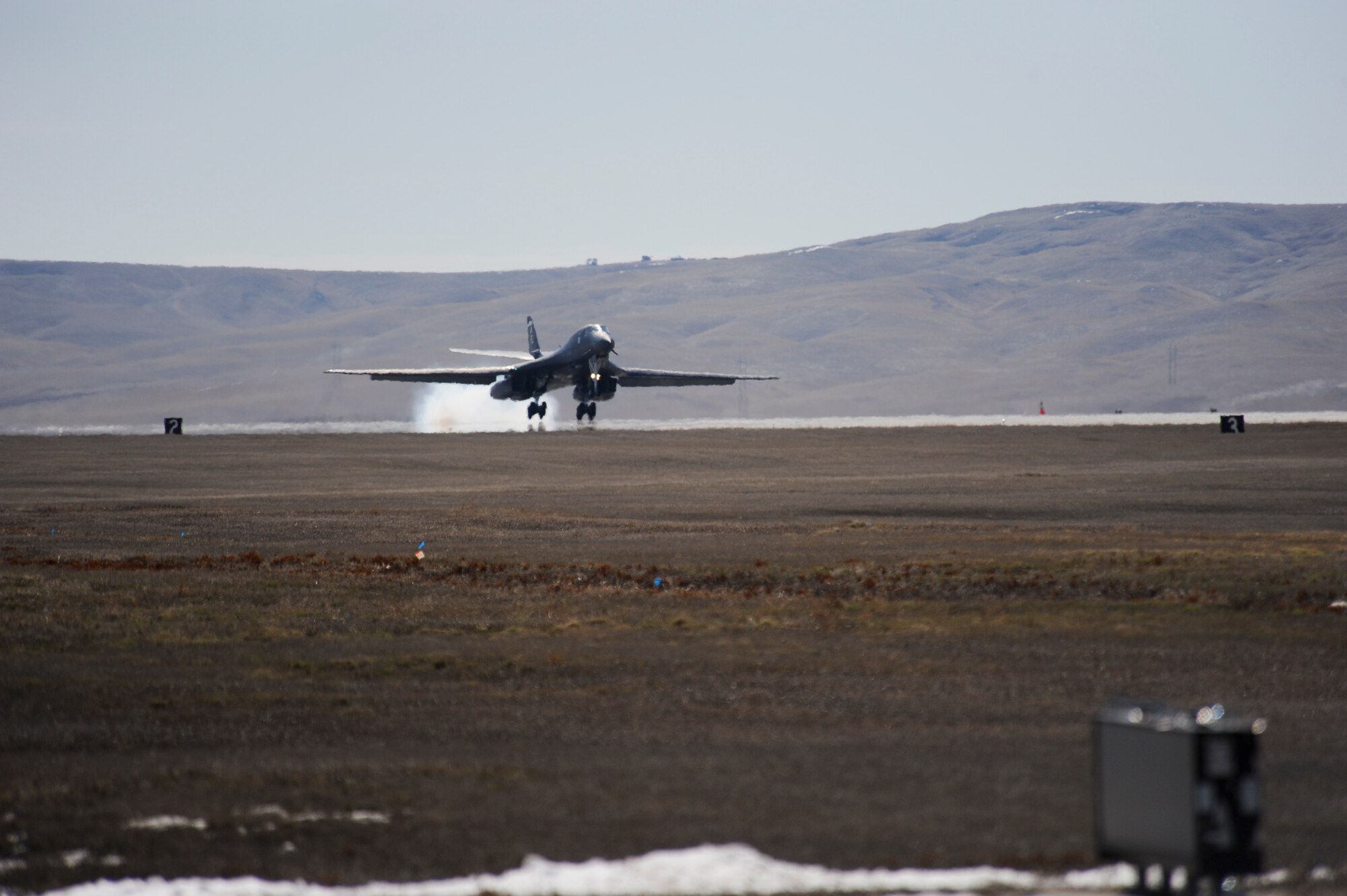 A B-1 Lancer from the 28th Bomb Wing lands following a mission in support of Operation Odyssey Dawn at Ellsworth Air Force Base, S.D., March 30, 2011. With less than two days notice, Airmen of the 28th Bomb Wing generated hundreds of weapons and launched several aircraft. (U.S. Air Force photo/Senior Airman Adam Grant)
