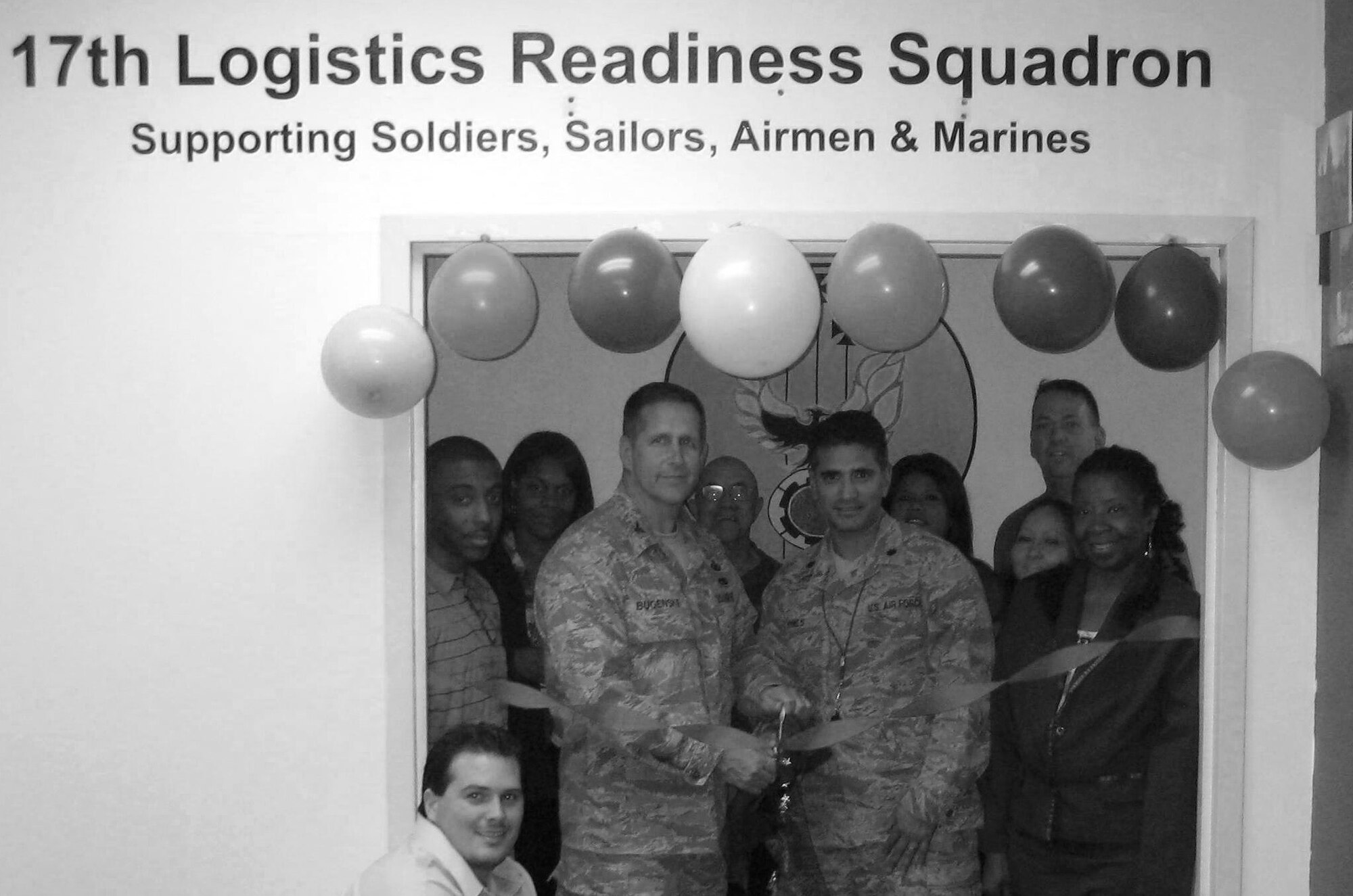 GOODFELLOW AIR FORCE BASE, Texas-- Col. Paul Bugenske, 17th Mission Support Group commander, and members of the Traffic Management Office cut a ribbon, March 31, to highlight the section's achievements. The team upgraded their internet café, revamped the customer waiting area and invested $35,000 in furniture upgrades. (Courtesy photo)