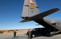 Unheard thirty five years ago when the 133rd Airlift Wing deployed to Yuma in Feb. 1976  women now occupy many of the same roles as men in the Air Force including the role of Loadmaster.  A all female group of Loadmasters marshals a truck from the cargo hold of a 133rd Airlift Wing, Minnesota Air National Guard C-130 Hercules cargo aircraft 27 Feb, 2011 Yuma Proving Ground Yuma, Ariz. U.S. Air Force photo by Tech. Sgt. Erik Gudmundson
