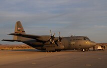 A C-130 Hercules is prepared for a return flight to Minnesota in the early morning sun on Mar. 4, 2011 at Yuma Proving Ground, Yuma, Ariz. During the week of Feb. 28th, 2011 Airmen and the C-130 of the 133rd Airlift Wing, Minnesota Air National Guard deployed for training to Yuma Proving Ground where they practiced Low-Cost Low-Altitude airdrops. This knowledge and experience will be directly applied during deployment to Afghanistan. The LCLA bundles are more accurate and use expendable parachutes weighing in at 80 to 500 pounds. LCLA is well suited for small units on patrol or in remote outposts where they don't have the equipment or manpower to deal with the larger container delivery system bundles. U.S. Air Force photo by Tech. Sgt. Erik Gudmundson