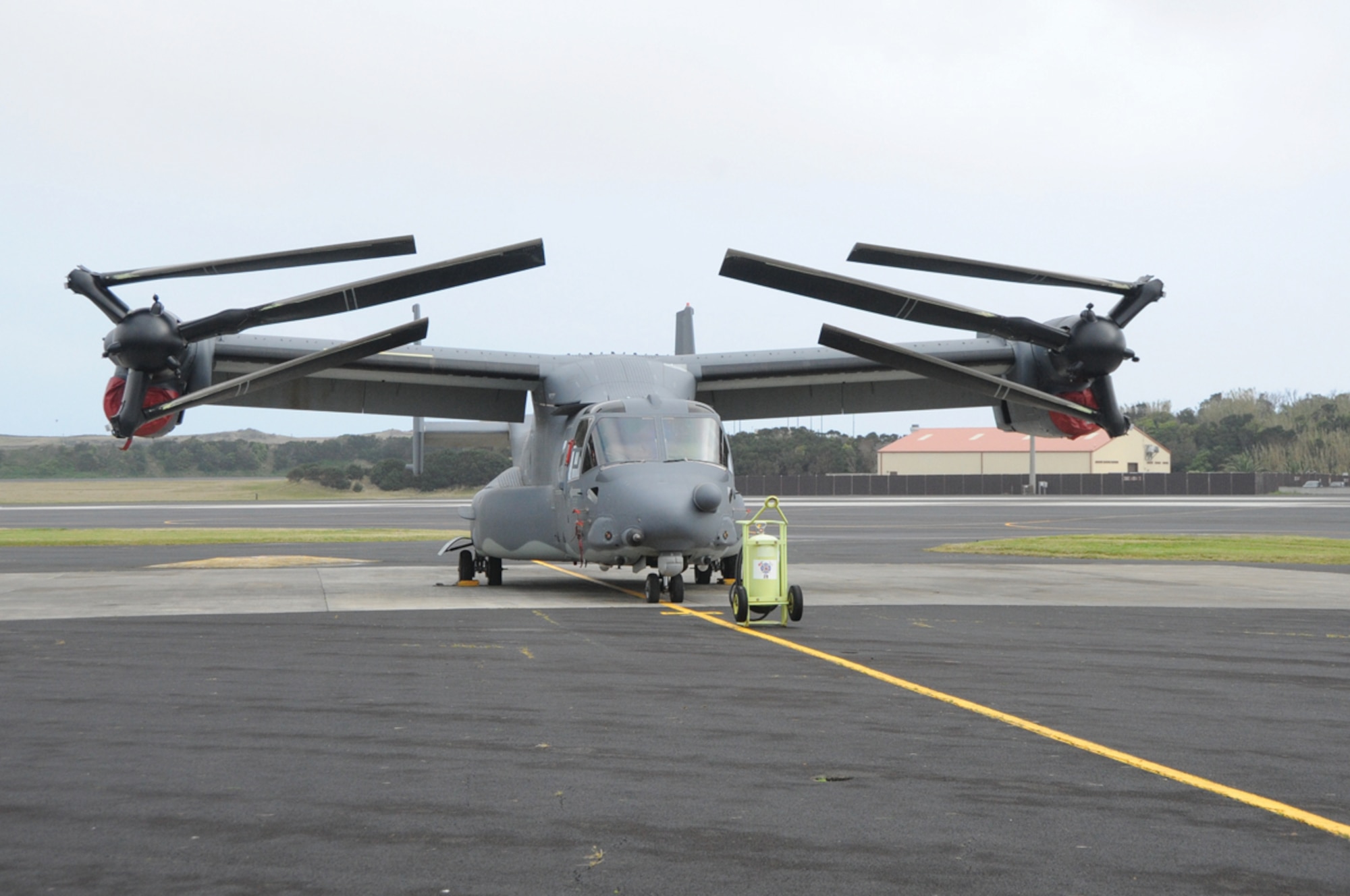 One of four CV 22 Osprey from Cannon Air Force Base, N.M., parks at Lajes Field, Azores, Portugal, on March 22 en route to support Joint Task Force Odyssey Dawn.  The Osprey have been a part of Cannon's mission since Oct. 1, 2010.  (Photo by Tech. Sgt. Chyrece Campbell)   
