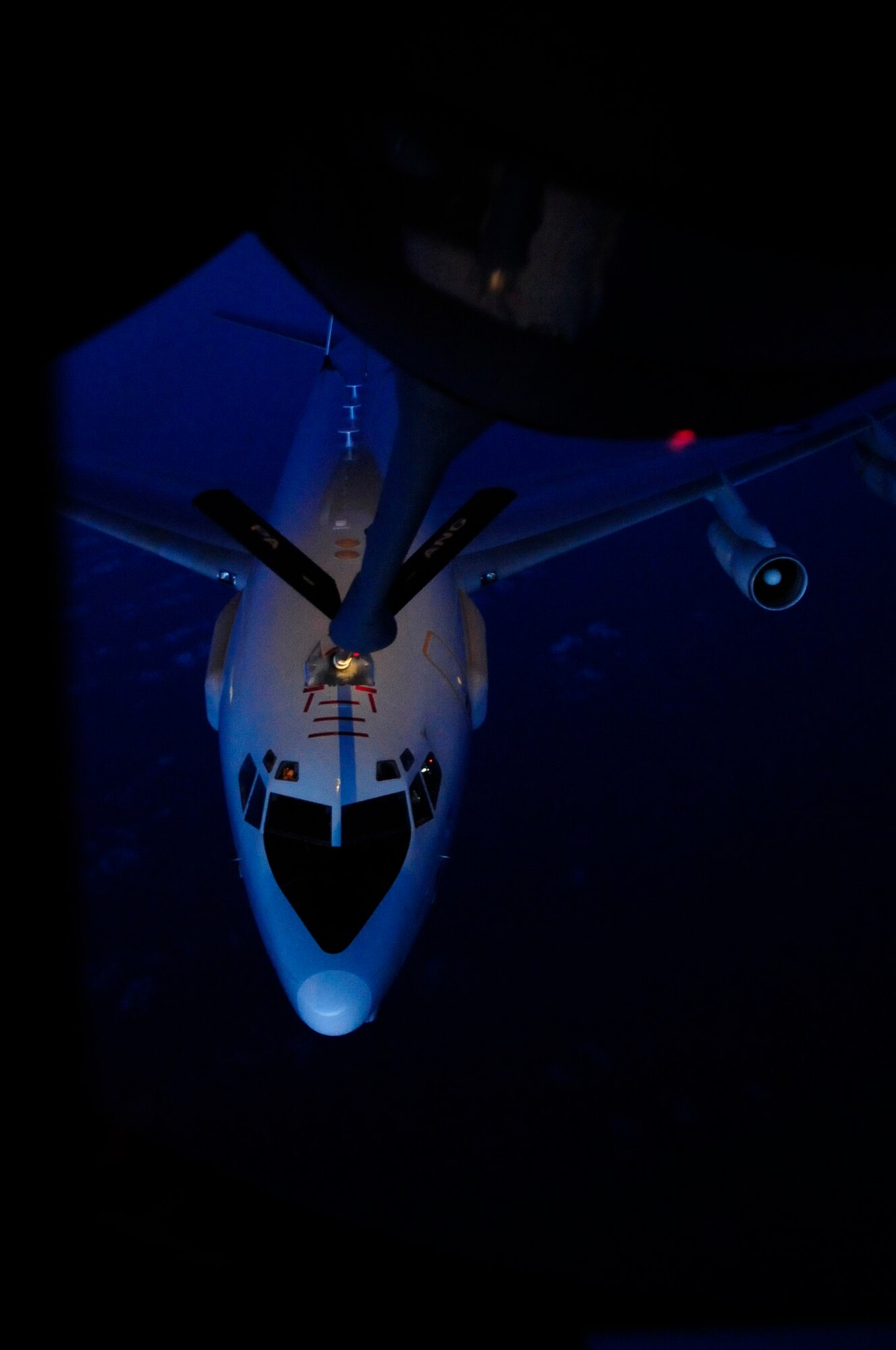 OVER THE MEDITERRENEAN SEA (March 28, 2011) -- A KC-135 Stratotanker refuels a Boeing E-3 Sentry Airborne Warning and Control System in support of Joint Task Force Odyssey Dawn. Joint Task Force Odyssey Dawn was the U.S. Africa Command task force established to provide operational and tactical command and control of U.S. military forces supporting the international response to the unrest in Libya and enforcement of United Nations Security Council Resolution (UNSCR) 1973. UNSCR 1973 authorizes all necessary measures to protect civilians in Libya under threat of attack by Gadhafi regime forces. JTF Odyssey Dawn was commanded by U.S. Navy Admiral Samuel J. Locklear III. (U.S. Air Force photo/Senior Airman Ethan Morgan)