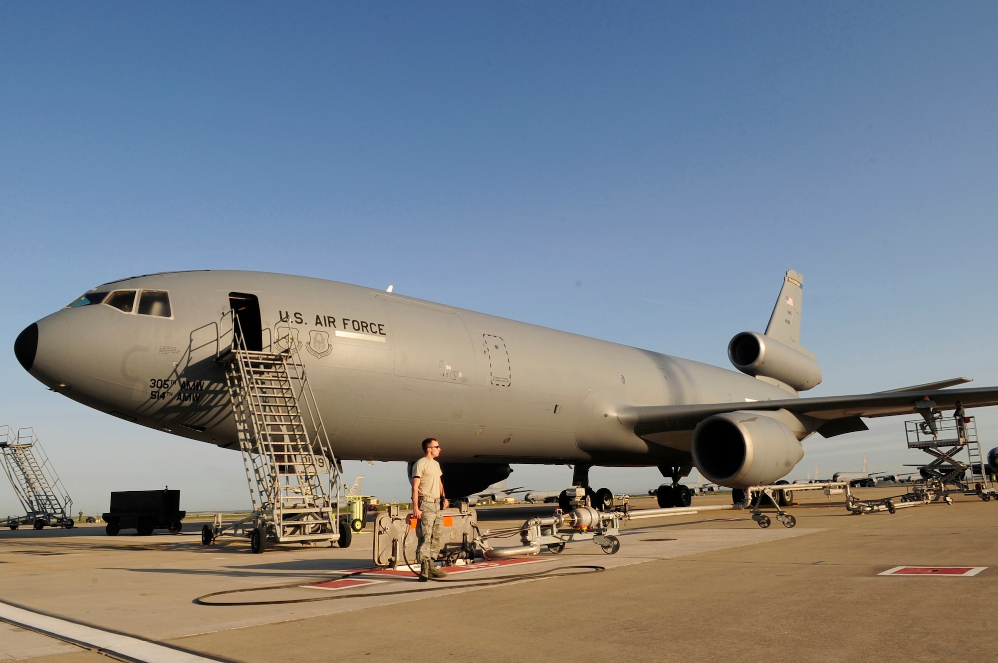 313th AIR EXPEDITIONARY WING (March 28, 2011) -- Airmen monitor the refueling of a KC-10 Extender while refueling it in support of Joint Task Force Odyssey Dawn. Joint Task Force Odyssey Dawn was the U.S. Africa Command task force established to provide operational and tactical command and control of U.S. military forces supporting the international response to the unrest in Libya and enforcement of United Nations Security Council Resolution (UNSCR) 1973. UNSCR 1973 authorizes all necessary measures to protect civilians in Libya under threat of attack by Gadhafi regime forces. JTF Odyssey Dawn was commanded by U.S. Navy Admiral Samuel J. Locklear III. (U.S. Air Force photo/Senior Airman Ethan Morgan)
