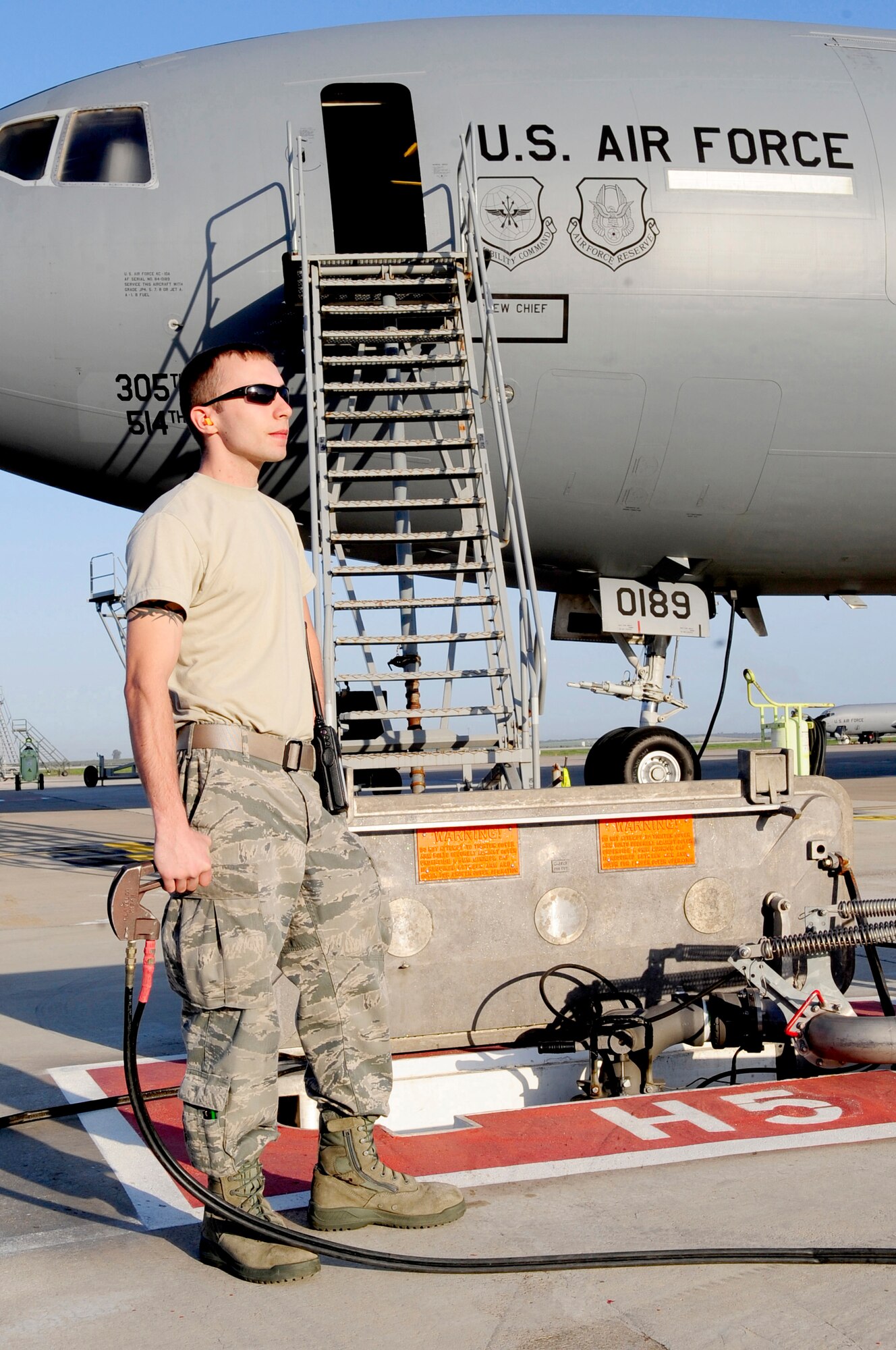 313th AIR EXPEDITIONARY WING (March 28, 2011) -- An 86th Logistics Readiness Squadron professional fuels handler, deployed from Ramstein Air Base, Germany, pumps fuel into a KC-10 Extender in support of Joint Task Force Odyssey Dawn. Joint Task Force Odyssey Dawn was the U.S. Africa Command task force established to provide operational and tactical command and control of U.S. military forces supporting the international response to the unrest in Libya and enforcement of United Nations Security Council Resolution (UNSCR) 1973. UNSCR 1973 authorizes all necessary measures to protect civilians in Libya under threat of attack by Gadhafi regime forces. JTF Odyssey Dawn was commanded by U.S. Navy Admiral Samuel J. Locklear III. (U.S. Air Force photo/Senior Airman Ethan Morgan)
