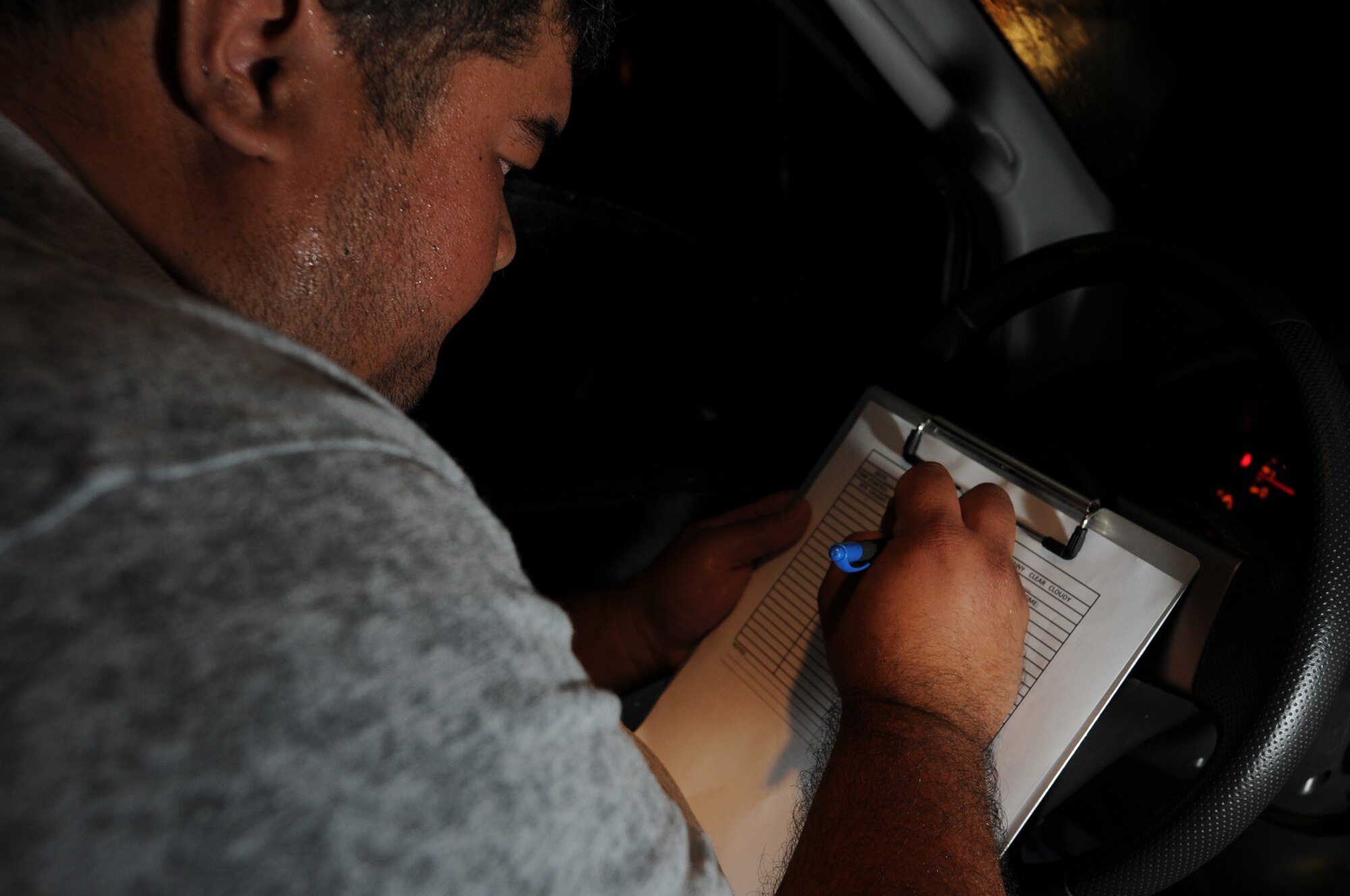 ANDERSEN AIR FORCE BASE, Guam -Joe Sablan, U.S. Department of
Agriculture, logs in each individual snake after being caught here, March
31.The log shows how many snakes were caught, where they were located, and
the time of night. (U.S. Air Force photo/ Senior Airman Carlin Leslie)
