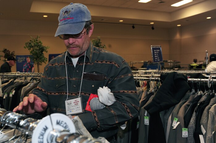 LAS VEGAS --  Terry Harmdierks, selects clothes from a Goodwill station during a Veterans Stand Down, March 24. The Veterans Stand Down provides homeless veterans emergency and supportive housing, food, health services, job training, legal aid and other assistance to help them live a better life.   (U.S. Air Force photo by Staff Sgt. William P.Coleman)
  

