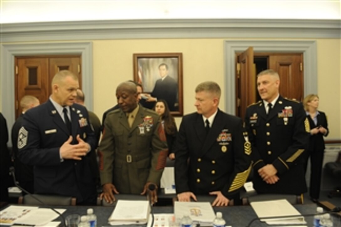 The senior enlisted leaders from the Air Force, Marines, Navy and Army prepare to testify before the House Subcommittee for Military Construction, Veterans Affairs and Related Agencies in Washington, D.C., on March 30, 2011.  Chief Master Sgt. of the Air Force James Roy (left), Sgt. Maj. of the Marine Corps Carlton Kent, Master Chief Petty Officer of the Navy Rick West and Sgt. Maj. of the Army Raymond Chandler (right) are all present.  
