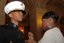 2nd Lt. Marques A. Williams' wife pins on his rank in the Minnesota State Capitol during his commissioning ceremony April 2. Williams is a 24-year-old St. Paul, Minn., native. For more photos of the event, visit www.facebook.com/rstwincities.