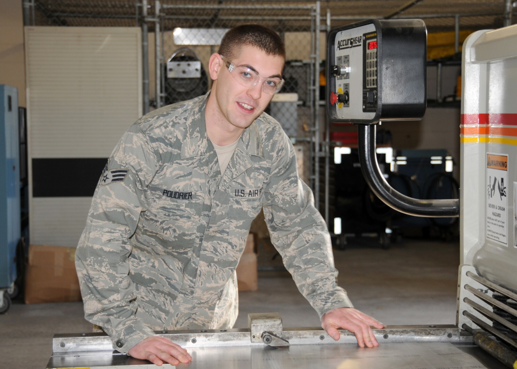Senior Airman Nate Poudrier is in his element as he expertly handles his duties in the structural maintenance shop during a drill weekend. 