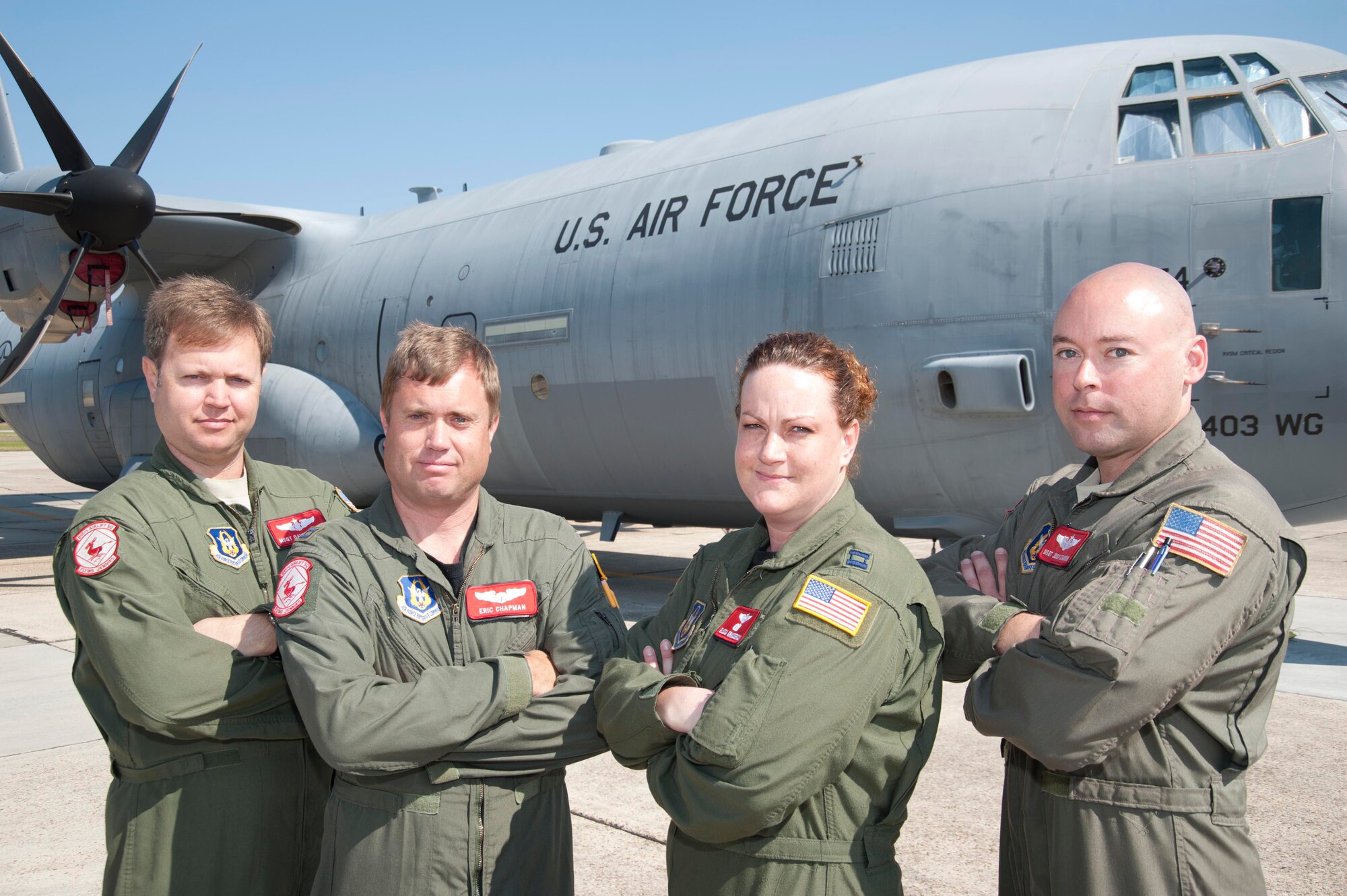 Aircrew for the 815th Airlift Squadron “Flying Jennies” pose in front of one of the squadron's C-130J-30 aircraft. Citizen Airmen from the Jennies train throughout the year to maintain their readiness for deployment in support of global contingencies. From left to right: Master Sgt. Dave Cooper, 815th AS loadmaster; Capts. Eric Chapman and Elissa Granderson, 815th AS pilots; Master Sgt. Josh Stanton, 815th loadmaster. (U.S. Air Force photo by Tech. Sgt. Ryan Labadens)
