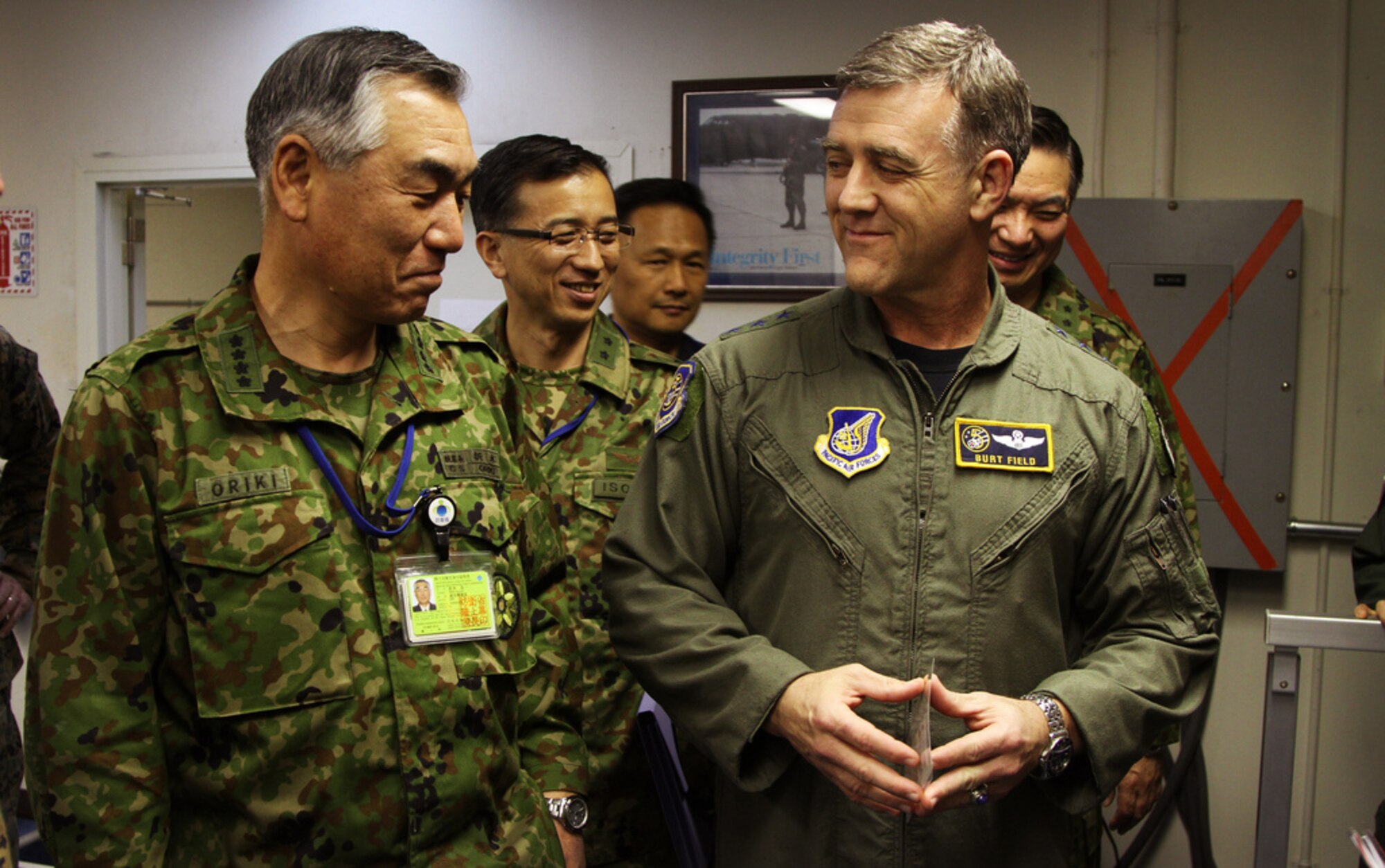 YOKOTA AIR BASE, Japan -- General Ryoichi Oriki, Chief of Staff, Joint Staff, Japan (left) is provided an overview of the Joint Support Force headquarters operations here Apr. 2, 2011 by Lt. Gen. Burton M. Field, Deputy Commander, Joint Support Force and Commander, 5th Air Force. Joint Support Force oversees U.S. military operations in support of Japan Self Defense Forces efforts in Operation Tomodachi. (U.S. Army photo by Spc. Tiffany Dusterhoft)
