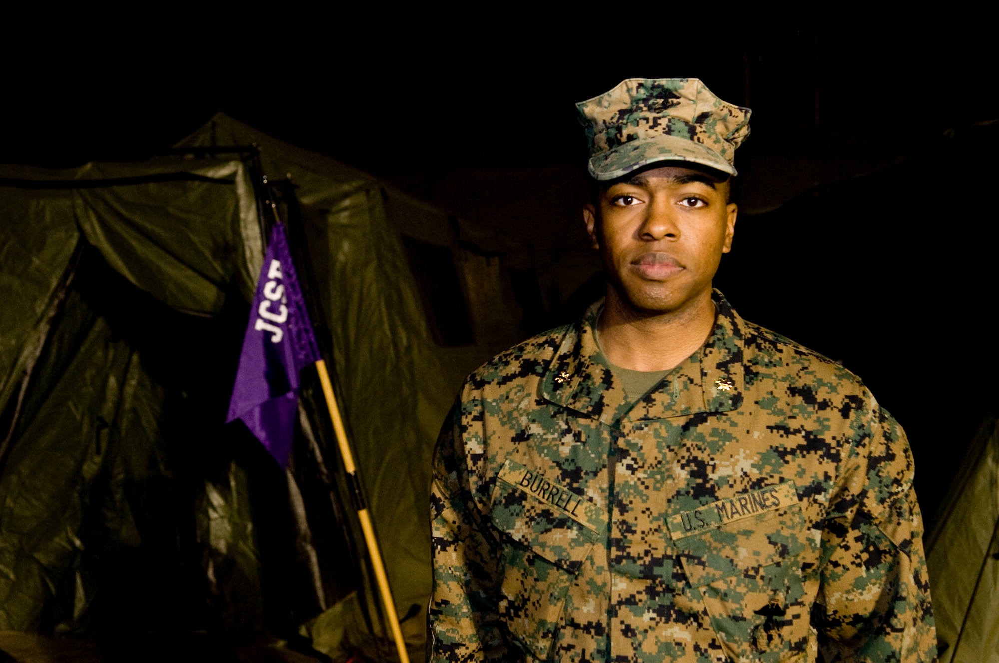 YOKOTA AIR BASE, Japan -- U.S. Marine Corps Maj. Eugene Burrell, Deployable Joint Command and Control System Officer in charge of Alpha Troop, is deployed to Yokota Air Base in support of Operation Tomodachi. The Washington D.C. native said, "When I initially saw the pictures and videos of the devastation that occurred in Japan, my heart went out to those affected by the tragedy. When I was asked to come here, I knew that we would be helping so many people.” (U.S. Air Force photo by/Master Sgt. Jeromy K. Cross)














