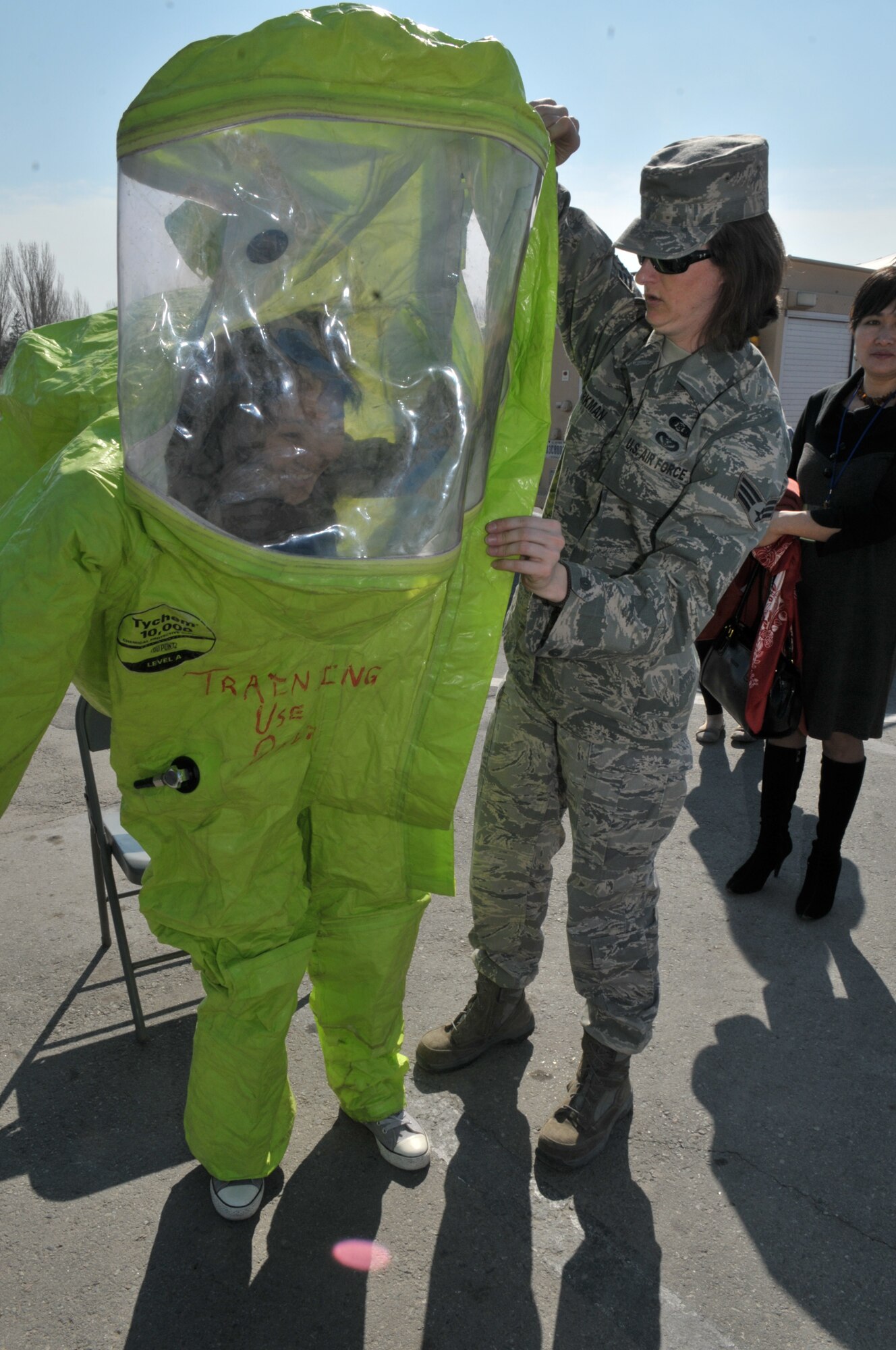 TRANSIT CENTER AT MANAS, Kyrgyzstan - Both Military members and more than 1500 Kyrgyz employees  along with their family members joined in festivities at the Transit Center at Manas Apr. 02.  The Transit Center held a friends and family day that included a barbeque, music, games, K-9 demonstration, and Explosive Ordnance Disposal demonstration. (U.S. Air Force photo/Staff Sgt. Stacy Moless)