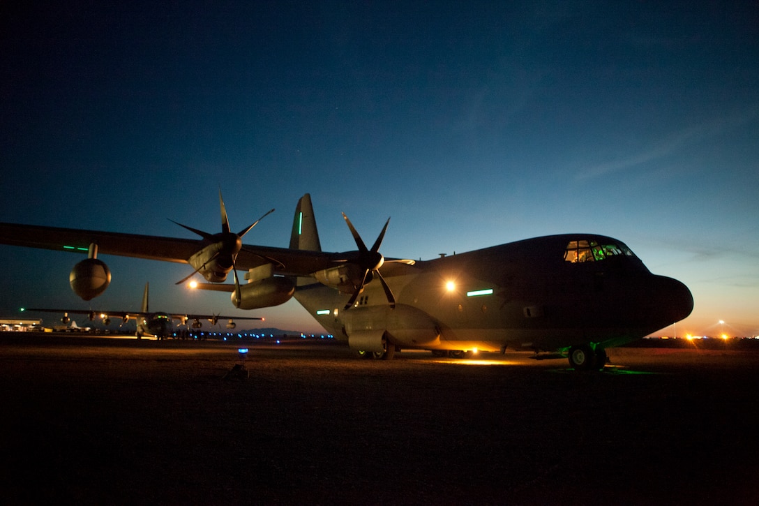 A KC-130J Hercules with Marine Aerial Refueler Transport Squadron 252 rests on the Camp Bastion flightline in Afghanistan, prior to escorting three MV-22B Osprey's with Marine Medium Tiltrotor Squadron 266 to Naval Support Activity Souda Bay, Greece, April 3. Marines planned and coordinated for more than one month in preparation for VMM-266's return flight to the USS Kearsarge, 26th Marine Expeditionary Unit, after a three month deployment in support of operations in Afghanistan.