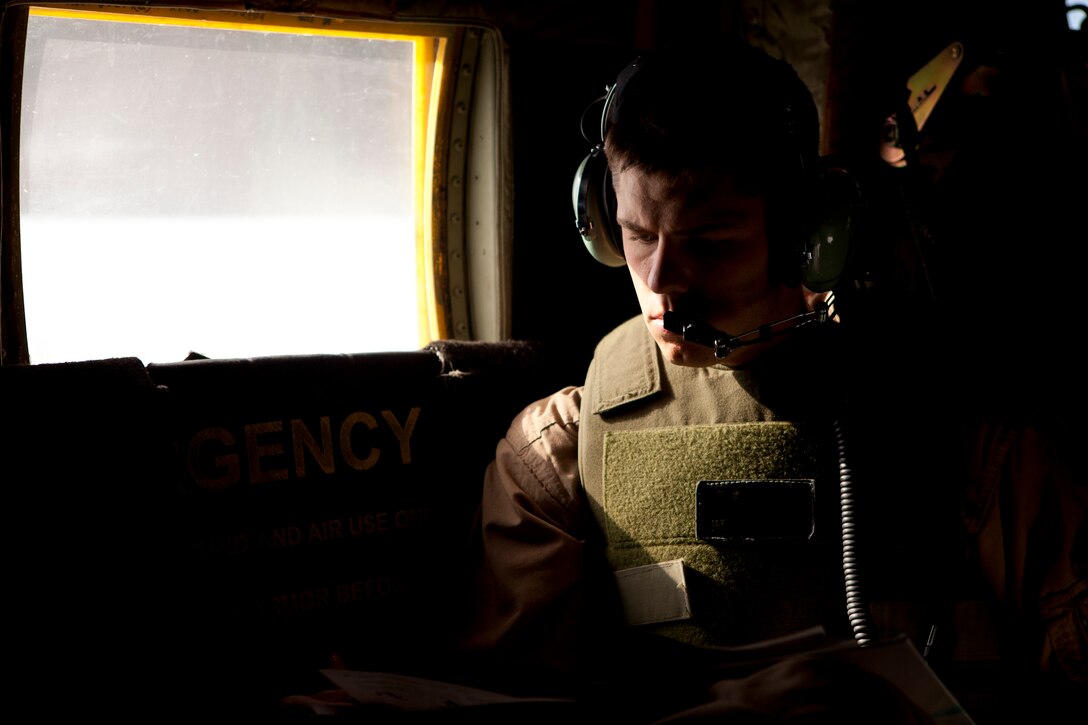 Lance Cpl. Hudson Baugh, a KC-130J Hercules loadmaster withMarine Aerial Refueler Transport Squadron 252, reads a book on mechanics during the 15-hour flight from Camp Bastion, Afghanistan to Naval Support Activity Souda Bay, Greece, April 3. Marines planned and coordinated for more than one month in preparation for the mission to return Marine Medium Tiltrotor Squadron 266 to the USS Kearsarge, 26th Marine Expeditionary Unit, after a deployment in support of operations in Afghanistan.