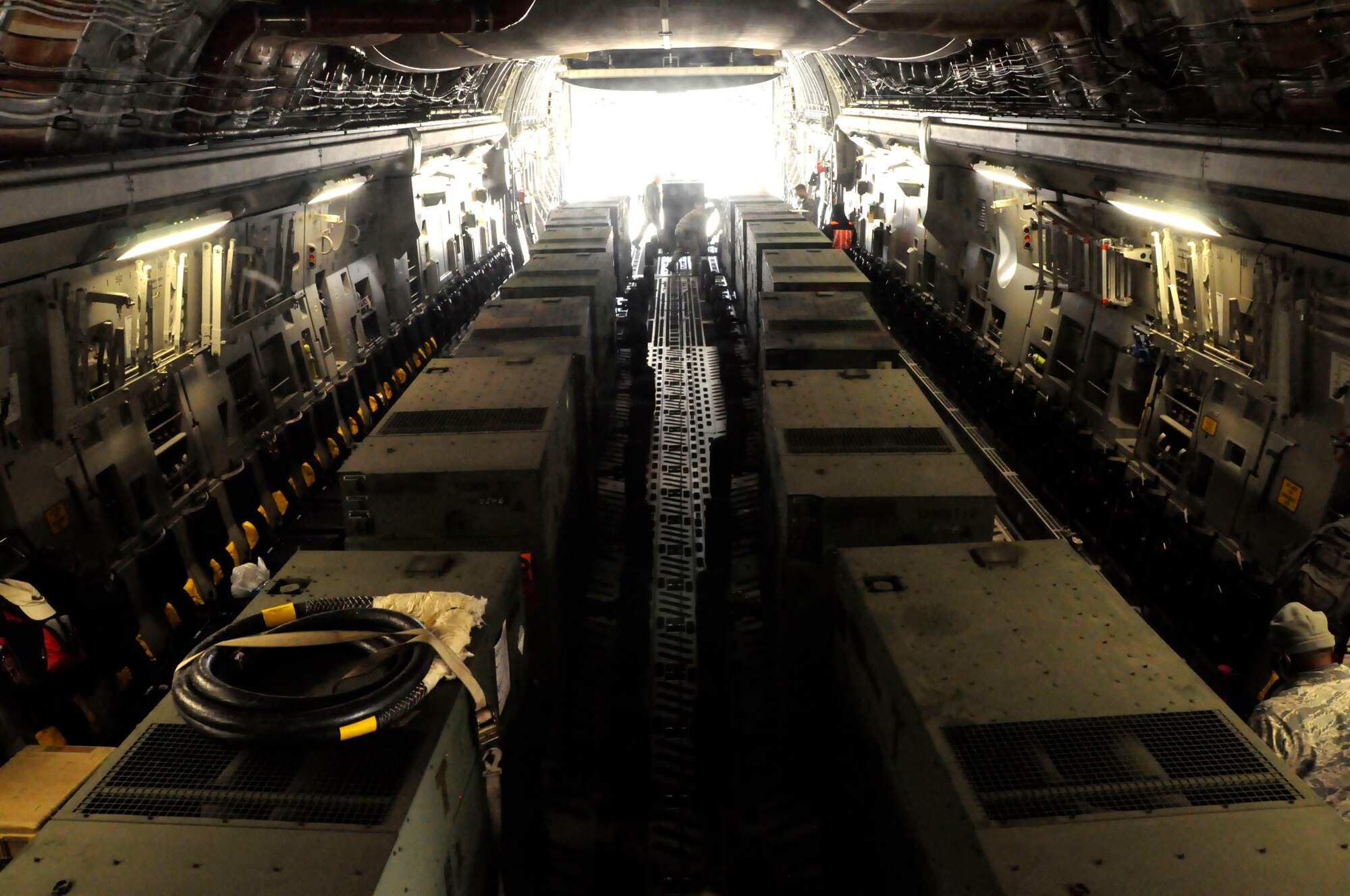 MISAWA AIR BASE, Japan – A U.S. Air Force C-17 Globemaster III assigned to Hickam Air Force Base, Hawaii, is loaded with 15 power generators at the flightline here April 2. The aircraft, flown by members of the 517th Airlift Squadron assigned to Joint Base Elmendorf-Richardson, Alaska, took the generators to Yokota Air Base, Japan, in support of Operation Tomodachi. (U.S. Air Force photo by Senior Airman Joe McFadden/Released)