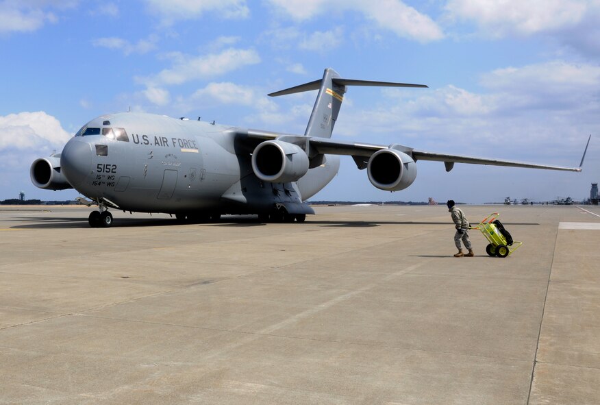MISAWA AIR BASE, Japan – A U.S. Air Force C-17 Globemaster III assigned to Hickam Air Force Base, Hawaii, lands at the flightline here April 2. The aircraft, flown by members of the 517th Airlift Squadron assigned to Joint Base Elmendorf-Richardson, Alaska, took 15 power generators to Yokota Air Base, Japan, in support of Operation Tomodachi. (U.S. Air Force photo by Senior Airman Joe McFadden/Released)