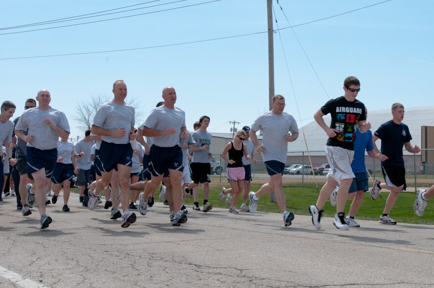 Members of the 139th Airlift Wing, St. Joseph, Mo., participate in the wing’s 5K Walk/Run, Saturday, April 02, 2011.  April is National Sexual Assault Awareness Month, and to show support the Sexual Assault Prevention and Response program put together this event. (U.S. Air Force photo by Airman 1st Class Kelsey Stuart)