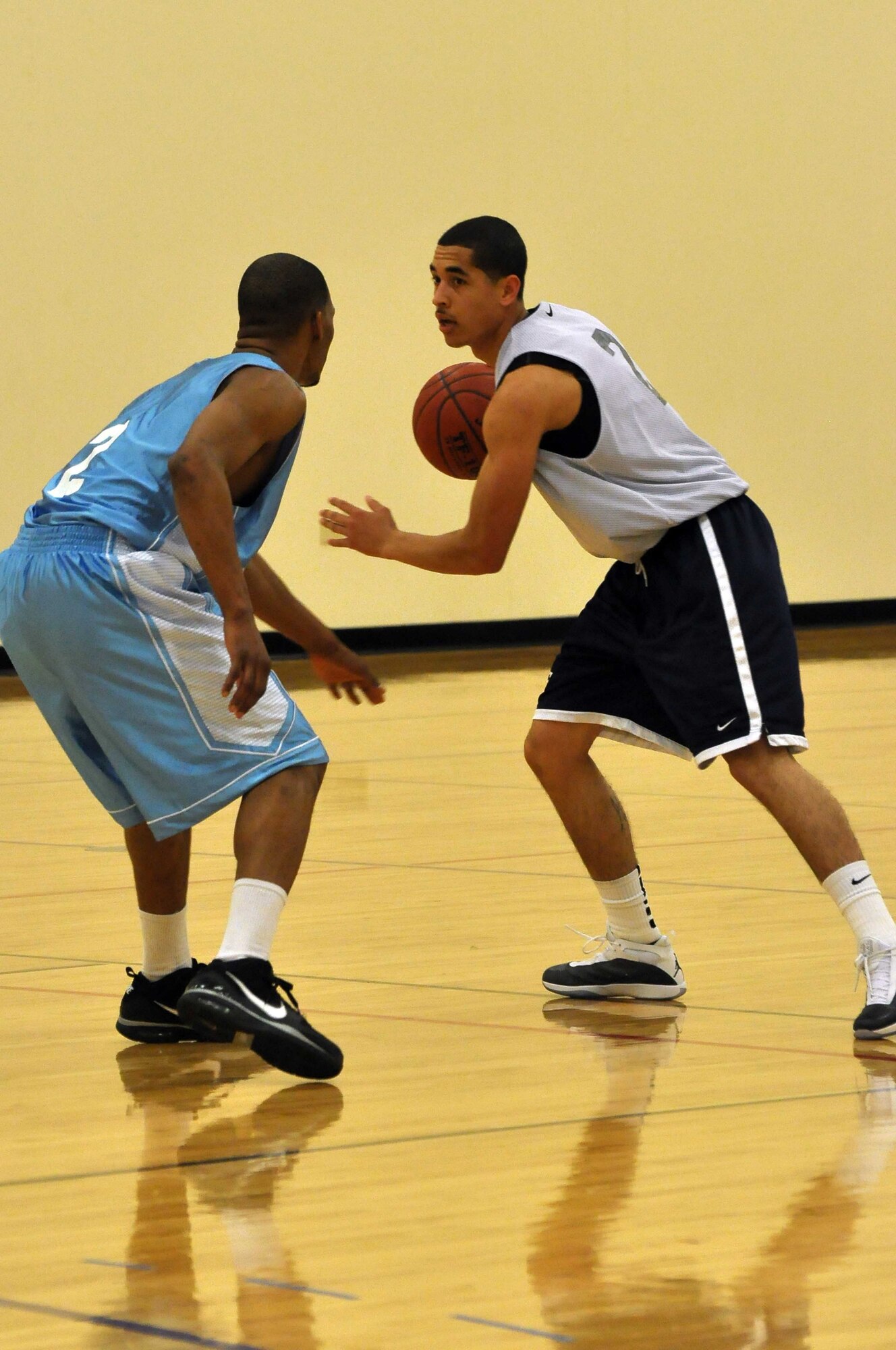 The Air Force basketball team (white) scrimmages the American Basketball Associations Minnesota Blizzards (blue) at the Minneapolis-St. Paul International Airport Air Reserve Station, Minn., April 2 2011. (Air Force Photo/TSgt Bob Sommer)
