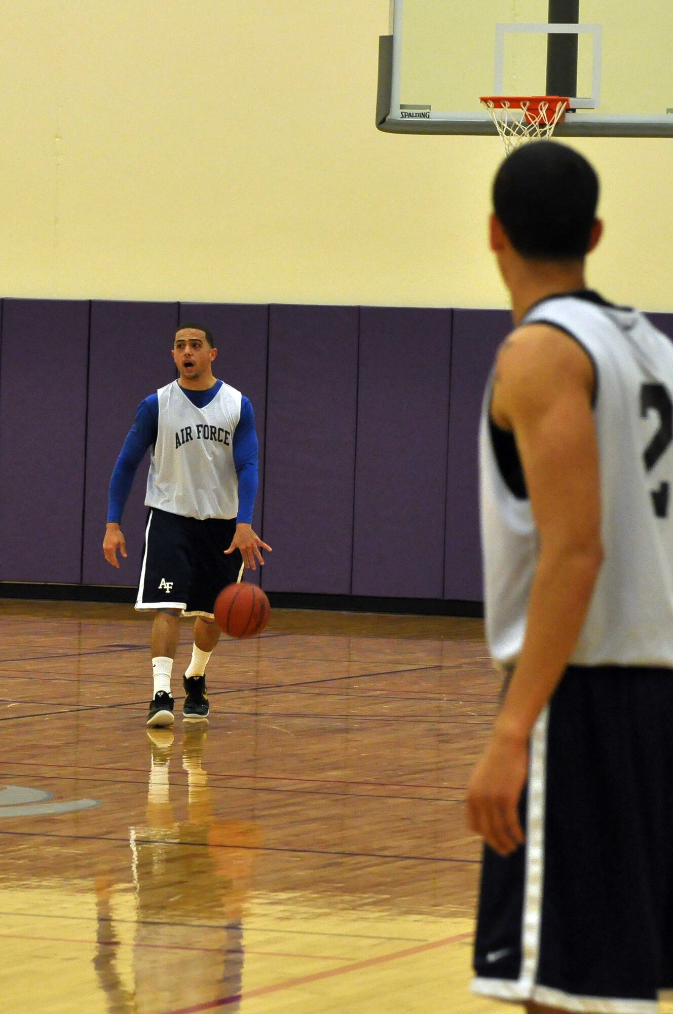 The Air Force basketball team (white) scrimmages the American Basketball Associations Minnesota Blizzards (blue) at the Minneapolis-St. Paul International Airport Air Reserve Station, Minn., April 2 2011. (Air Force Photo/TSgt Bob Sommer)